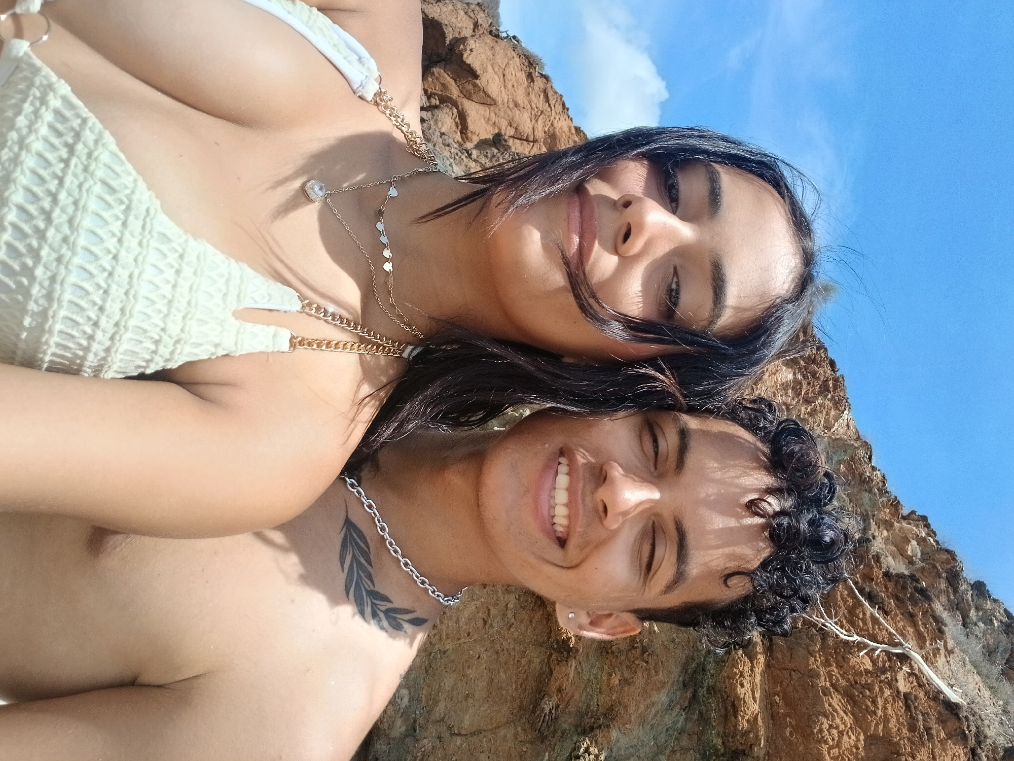 Couple documents beach day with photos in Juan Griego