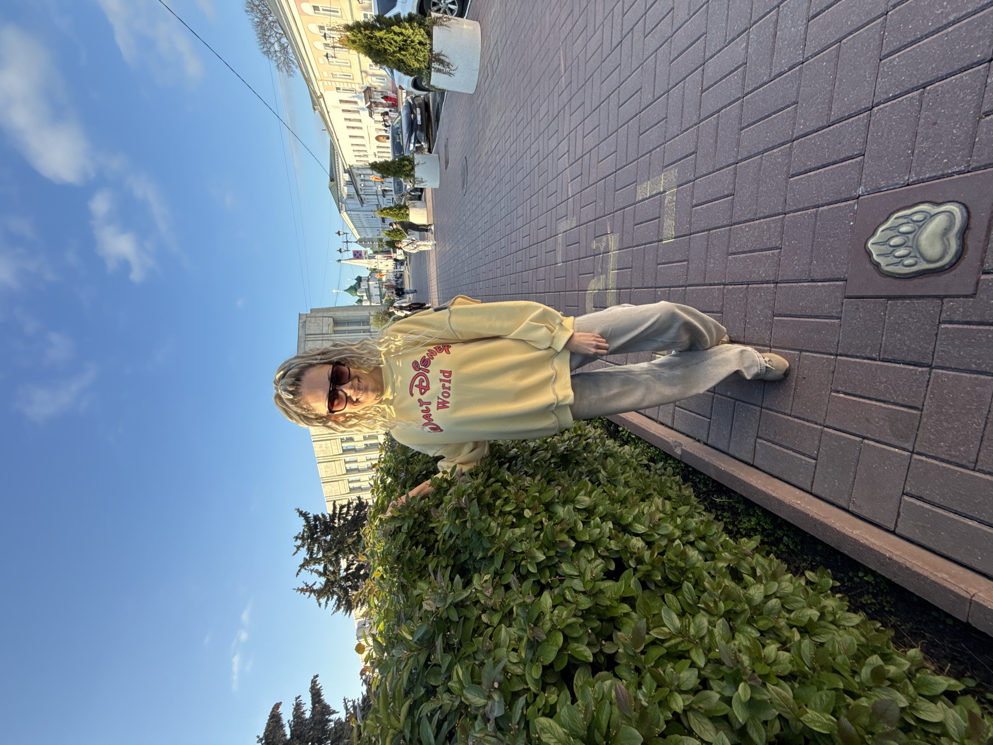 Woman in Disney sweatshirt photographed in Shebunino, Russia