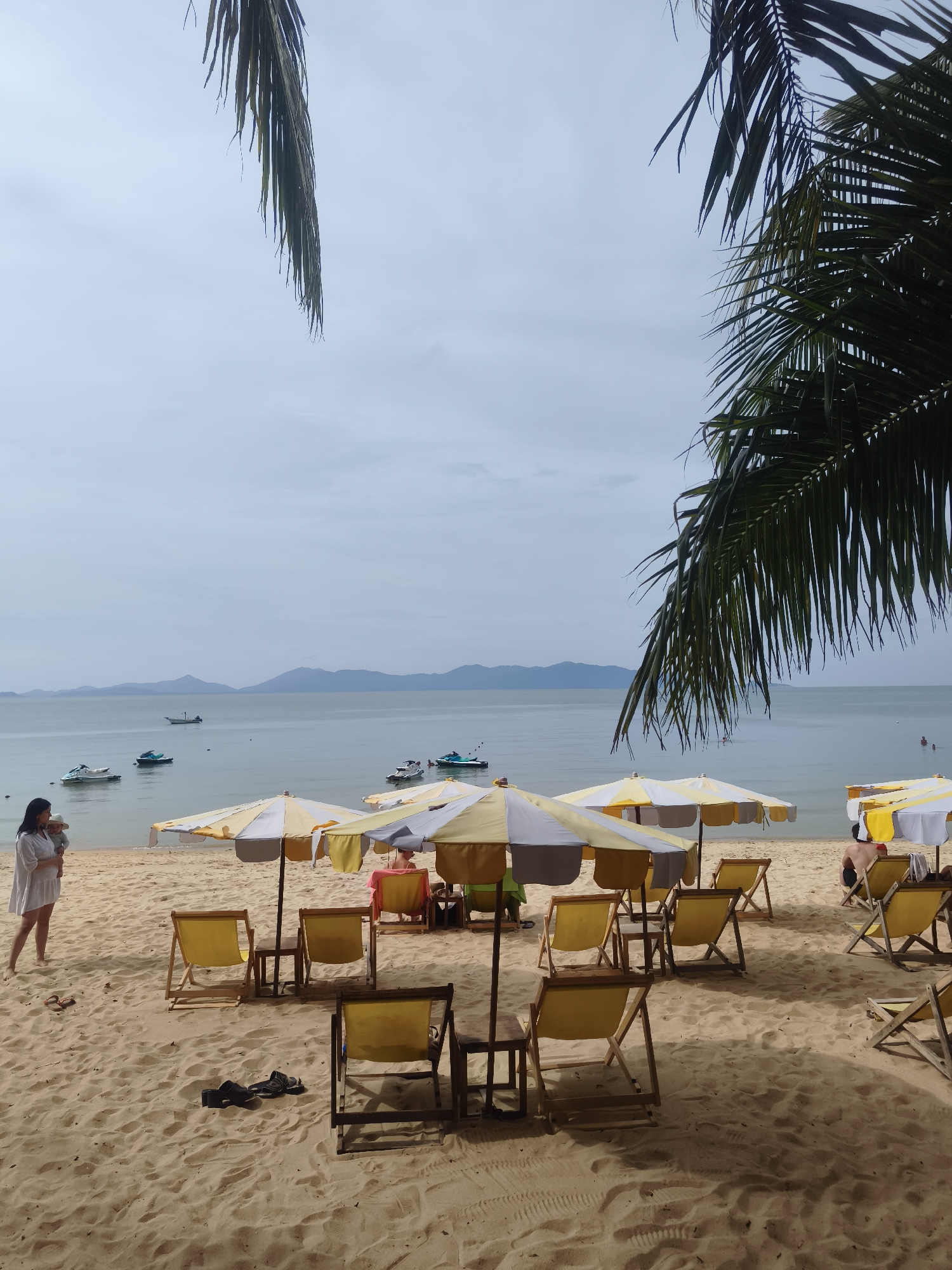 Family beach day activities documented at Baan Mae Nam Thailand