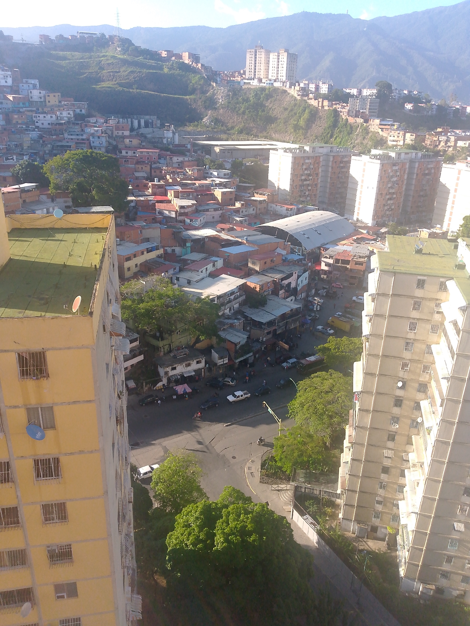 Caracas cityscape and hillside barrios on a clear afternoon