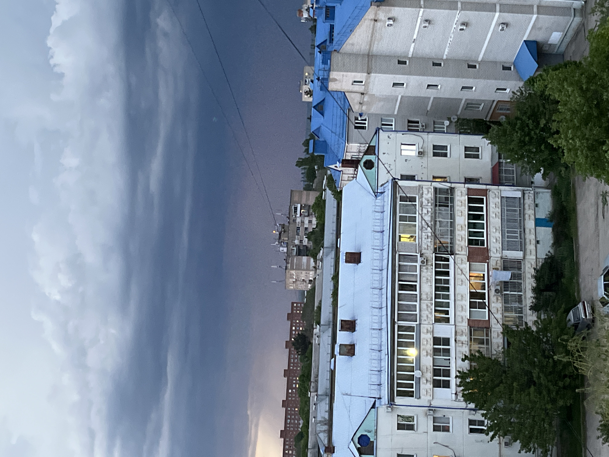 Aerial view captures Glubokiy cityscape under cloudy skies