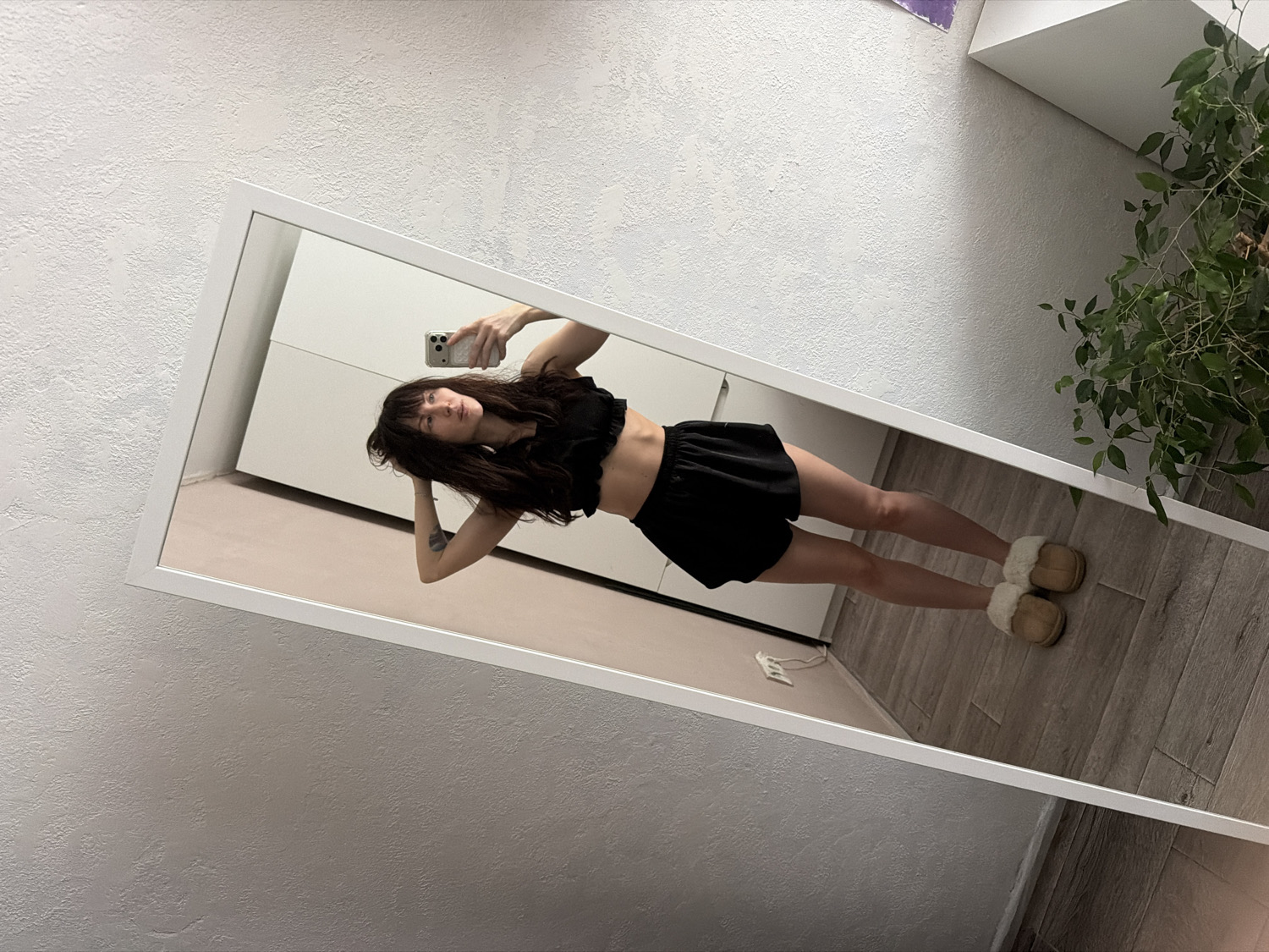Woman takes mirror selfie in Perm, Russia