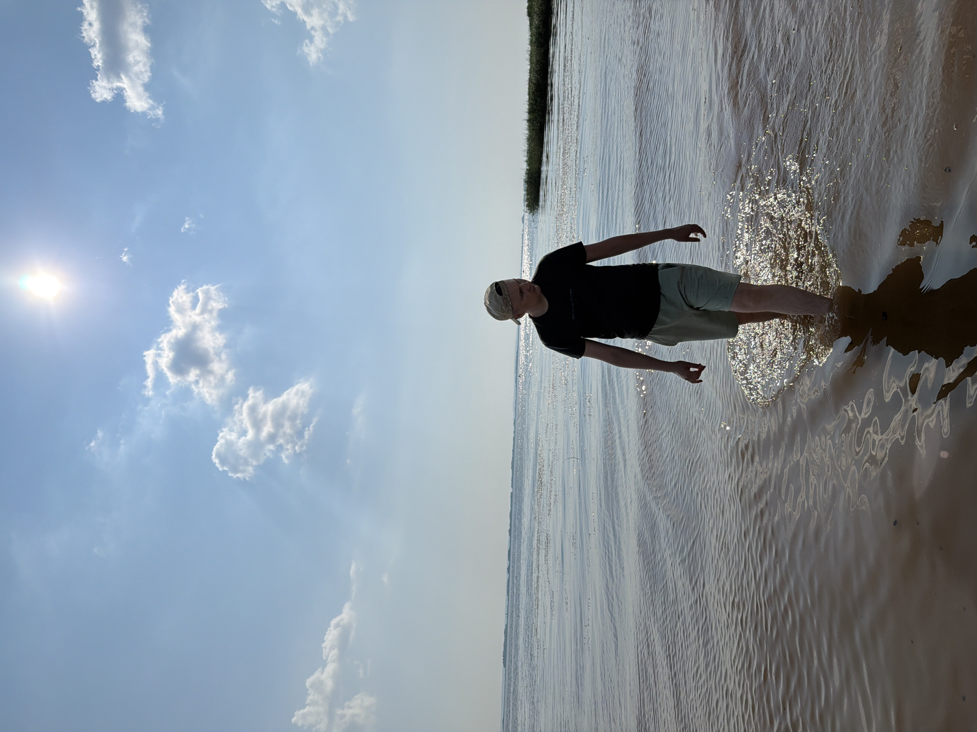 Lazy afternoon boating and wading on a Krasnyi Bor waterway.