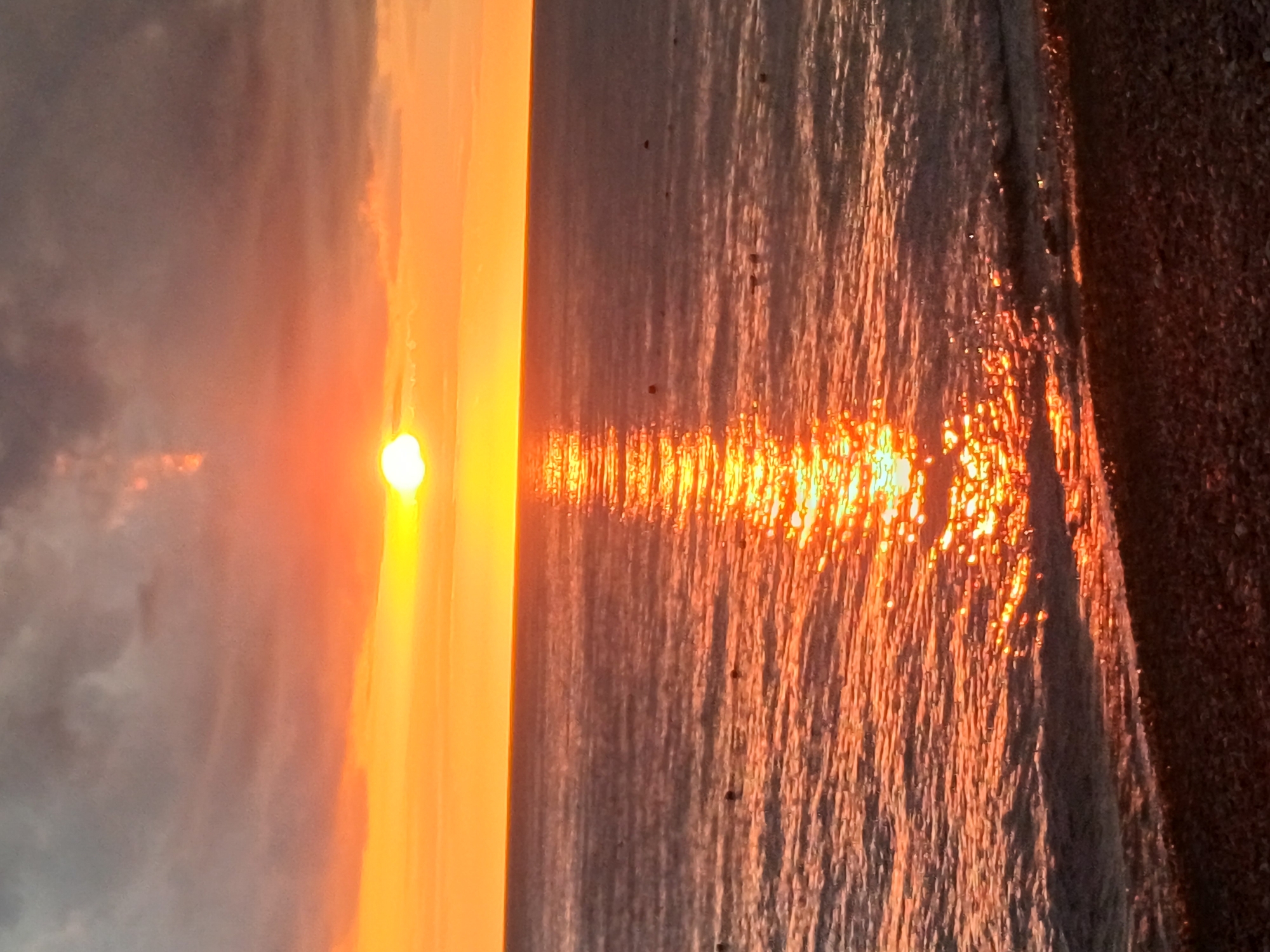 Golden sunset over the Black Sea, Sochi pebble beach