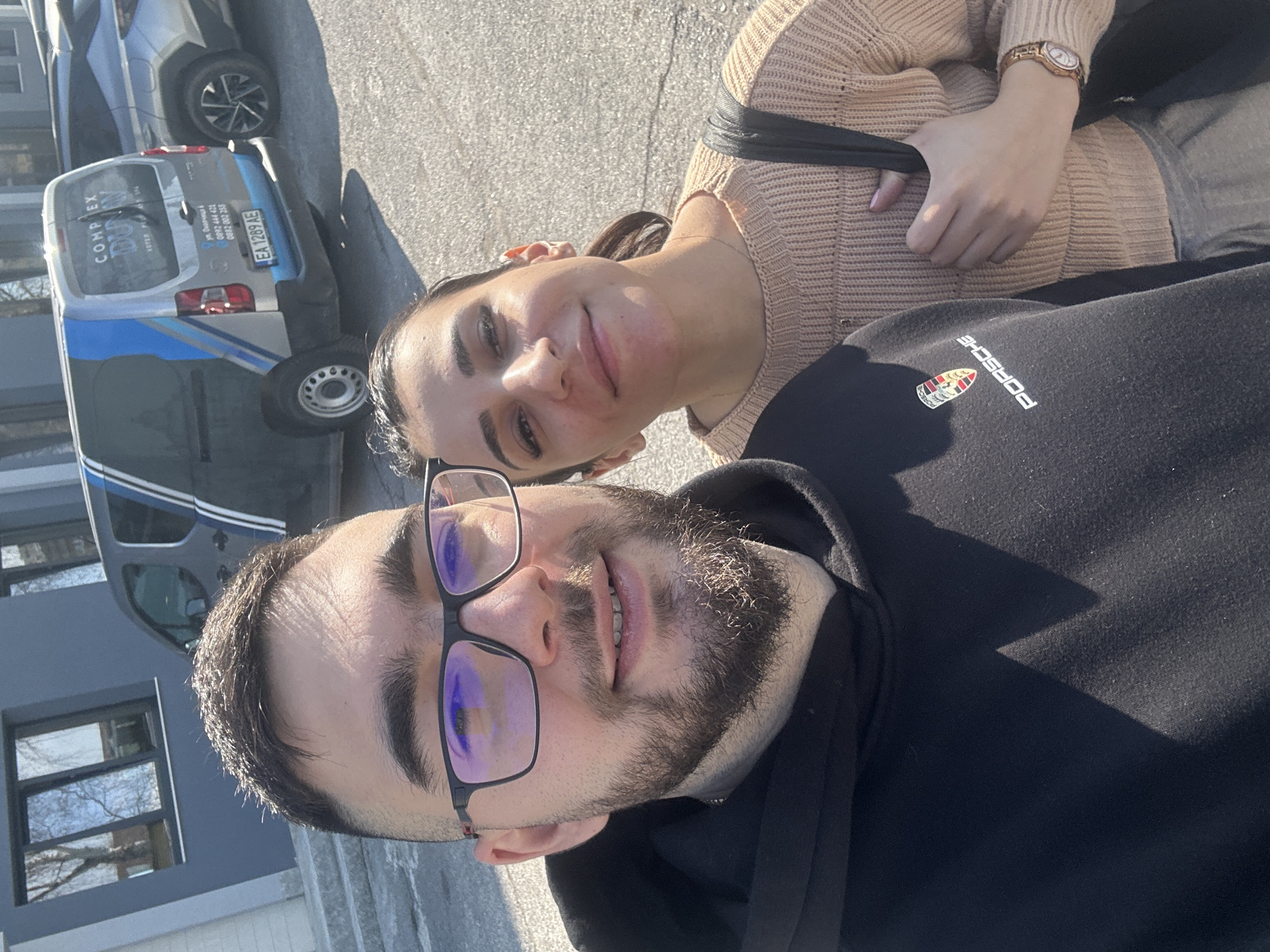 Couple takes selfie outside building in Ruse, Bulgaria