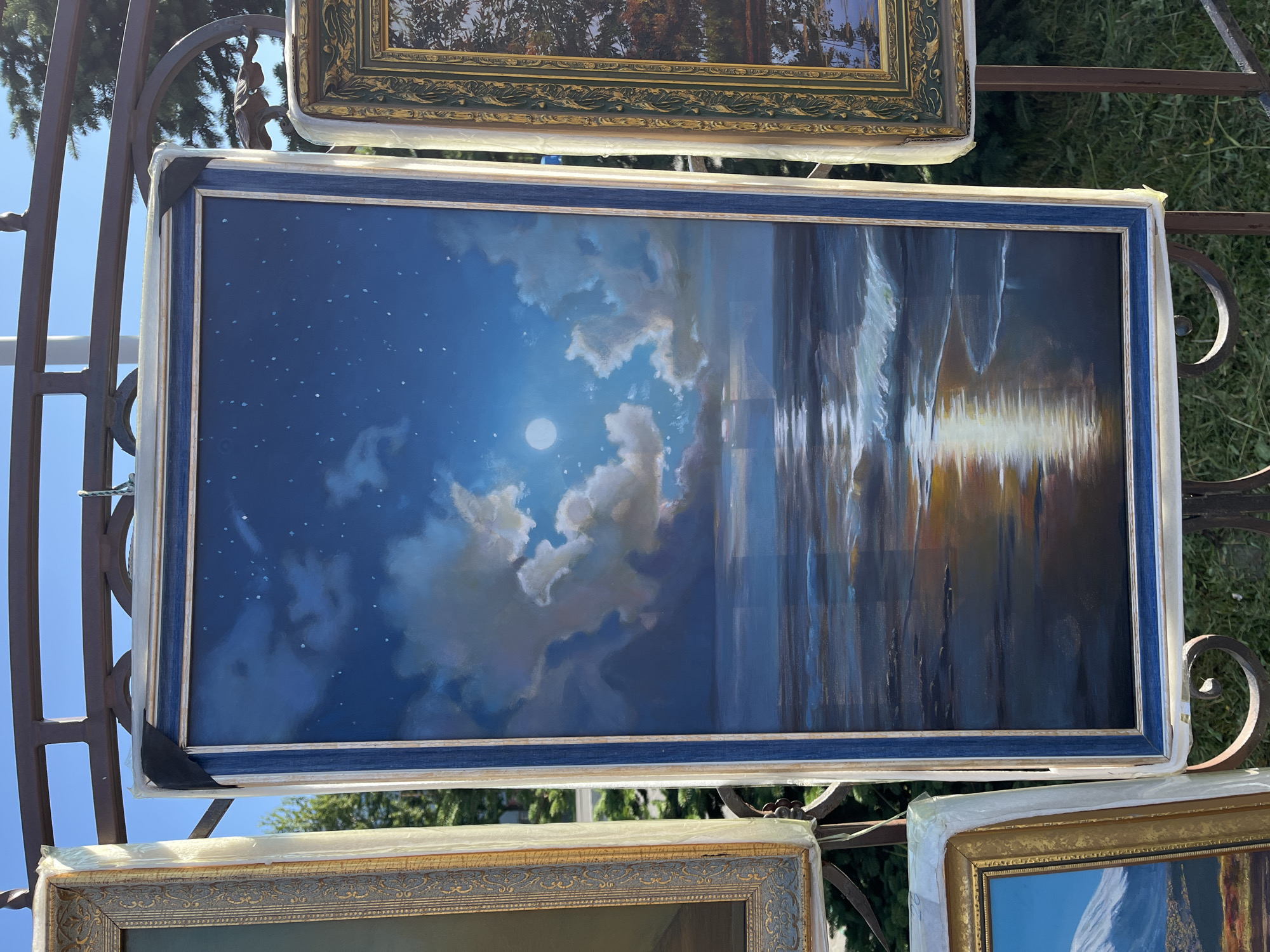 Outdoor art display and city streets with volcano backdrops in Kamchatka