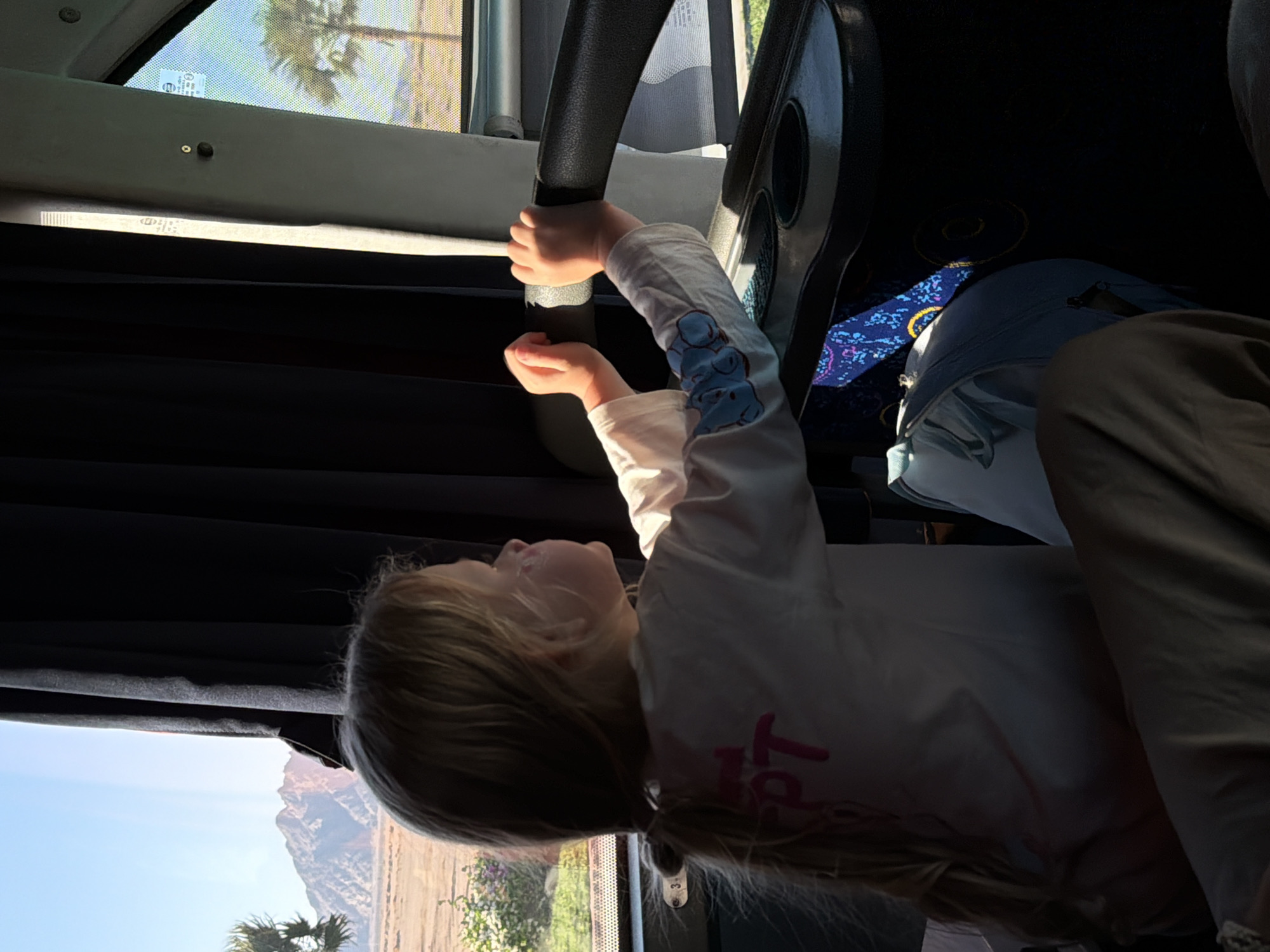Young girl spotted riding bus in Egypt