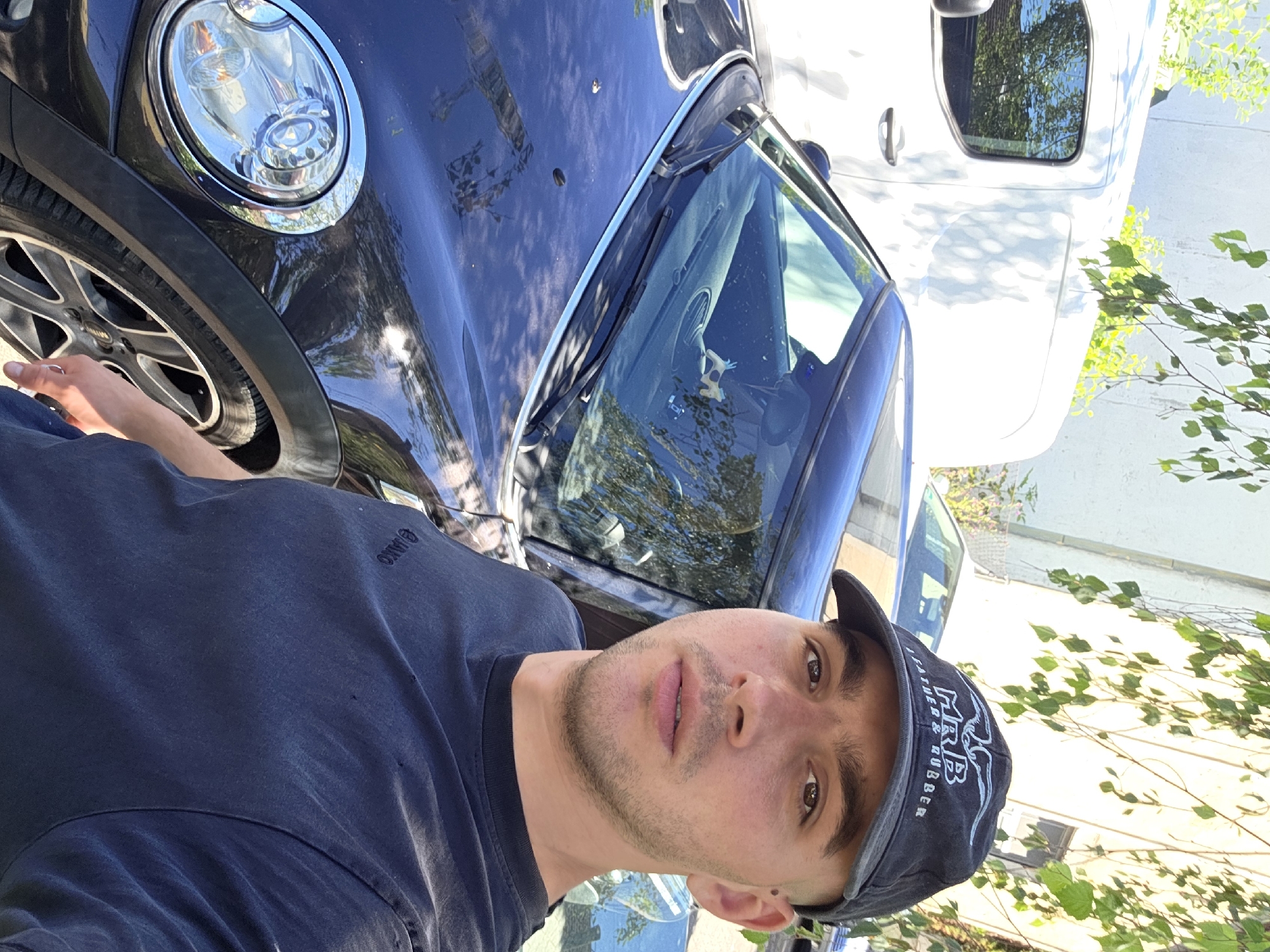 Mini Cooper in for bodywork, new tires on deck