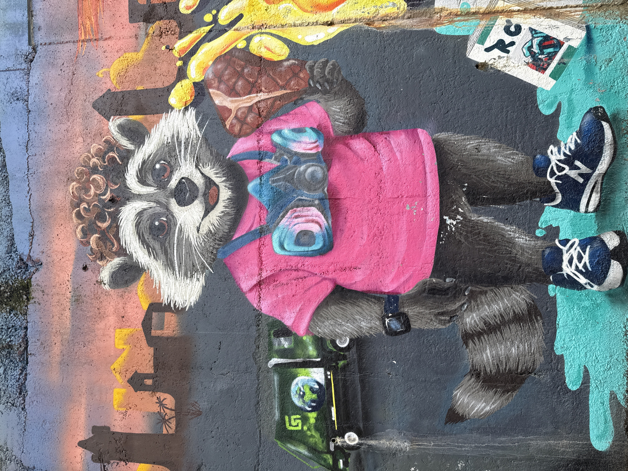 Bucharest alleyway walls covered in vivid, eclectic street murals