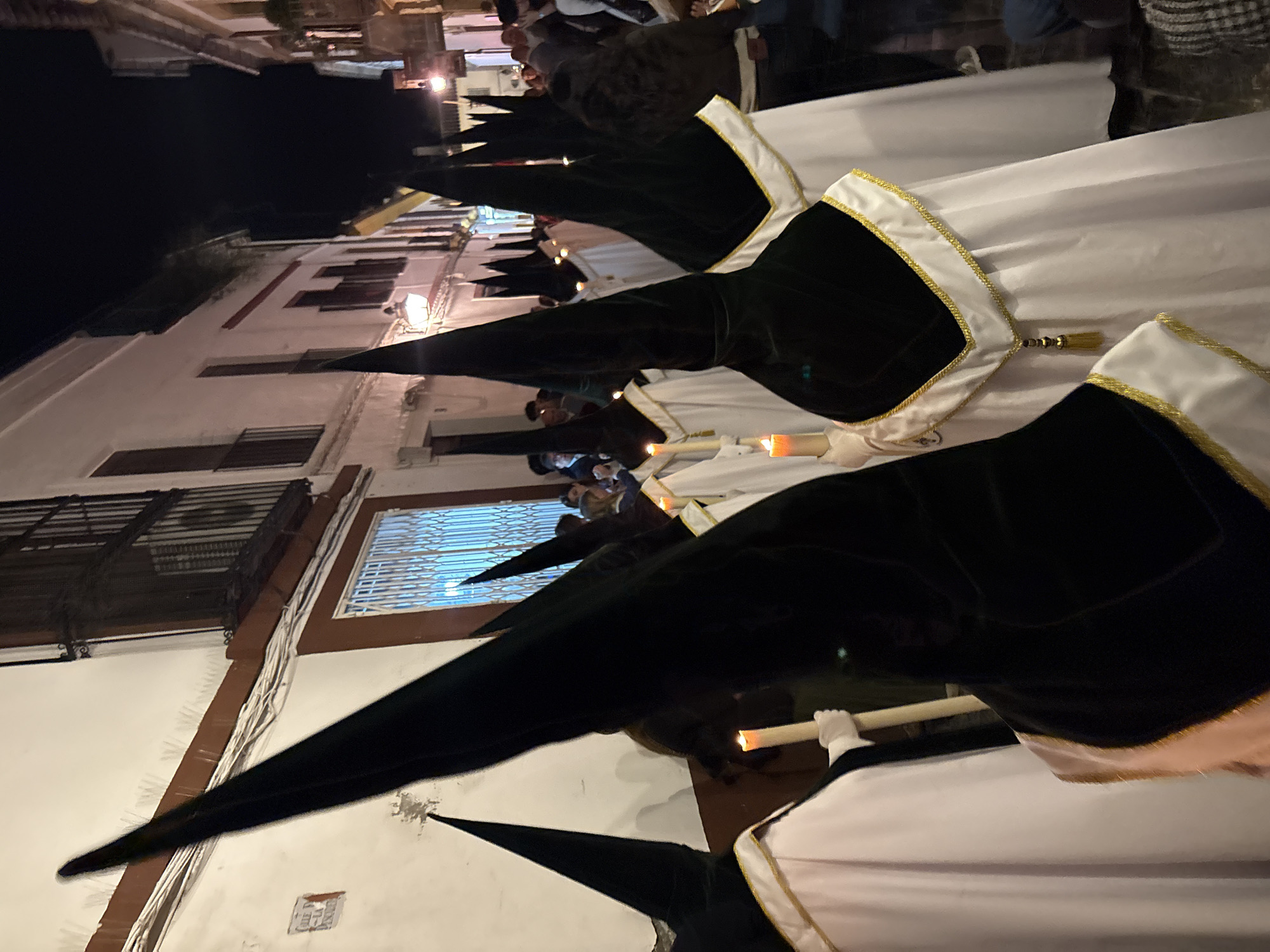 Religious procession with ornate floats winds through Córdoba streets