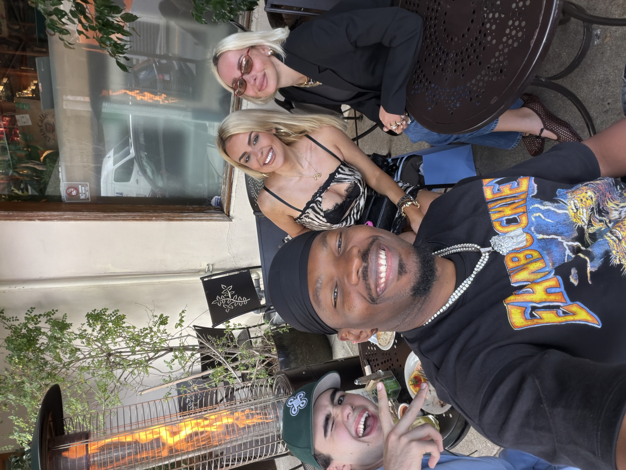 Four friends take late-night selfie at West Hollywood restaurant