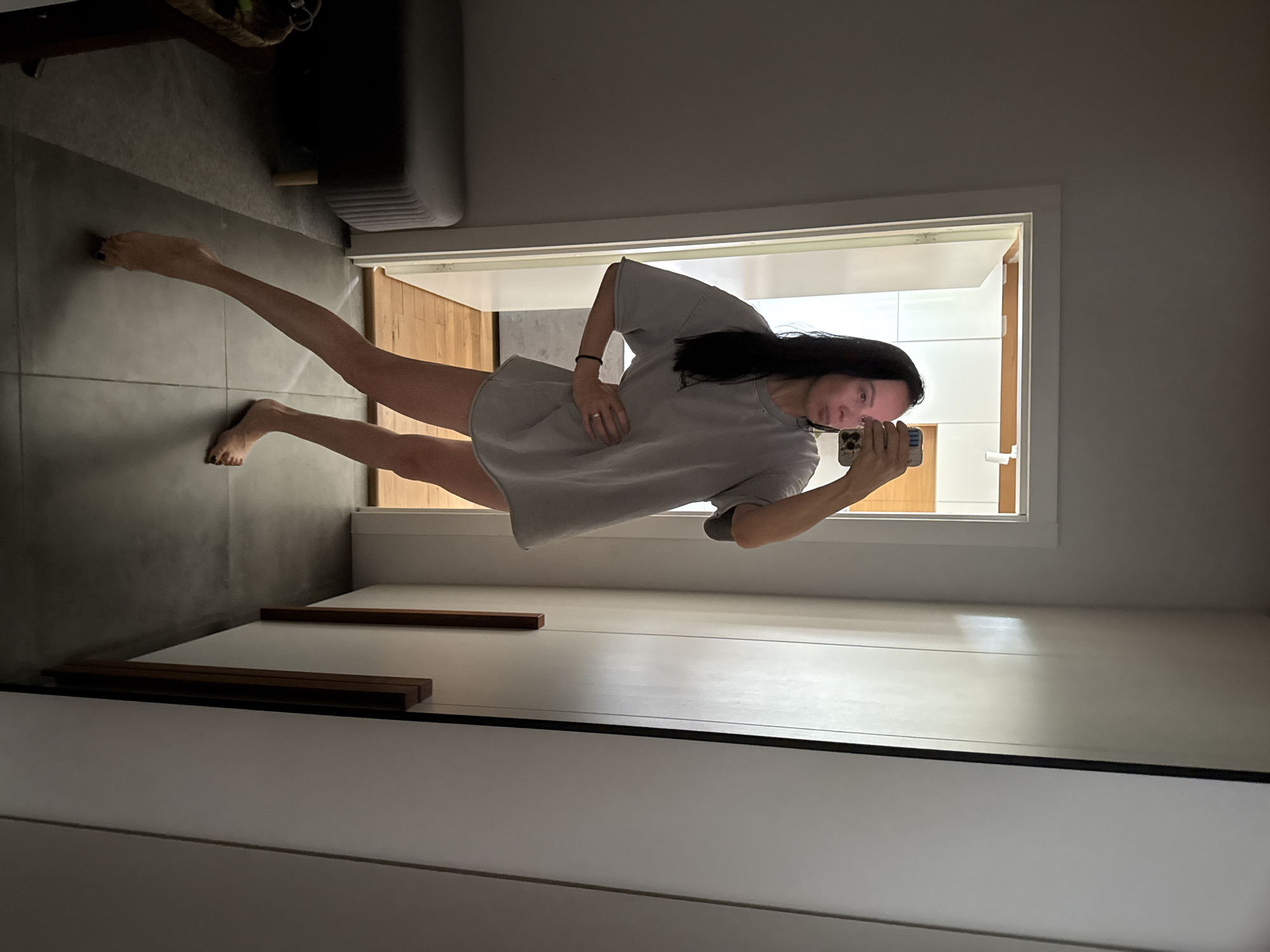 Mirror selfies and a sleepy schnauzer in a Chaikovsky apartment