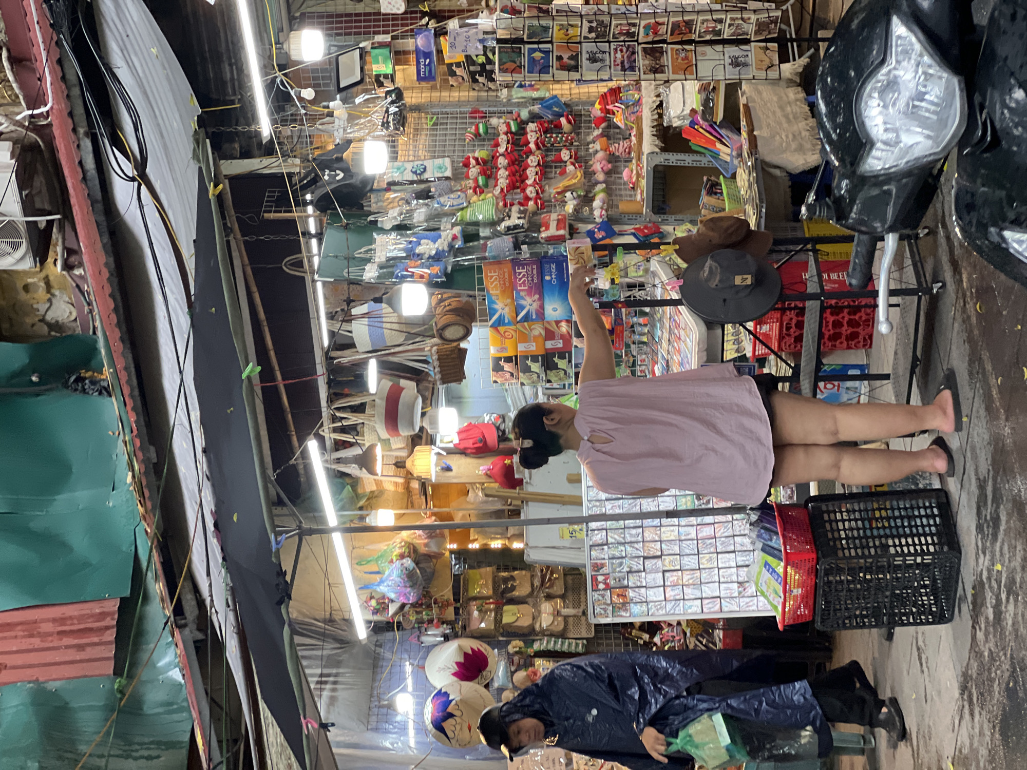 Rainy morning street life across Hanoi's Old Quarter