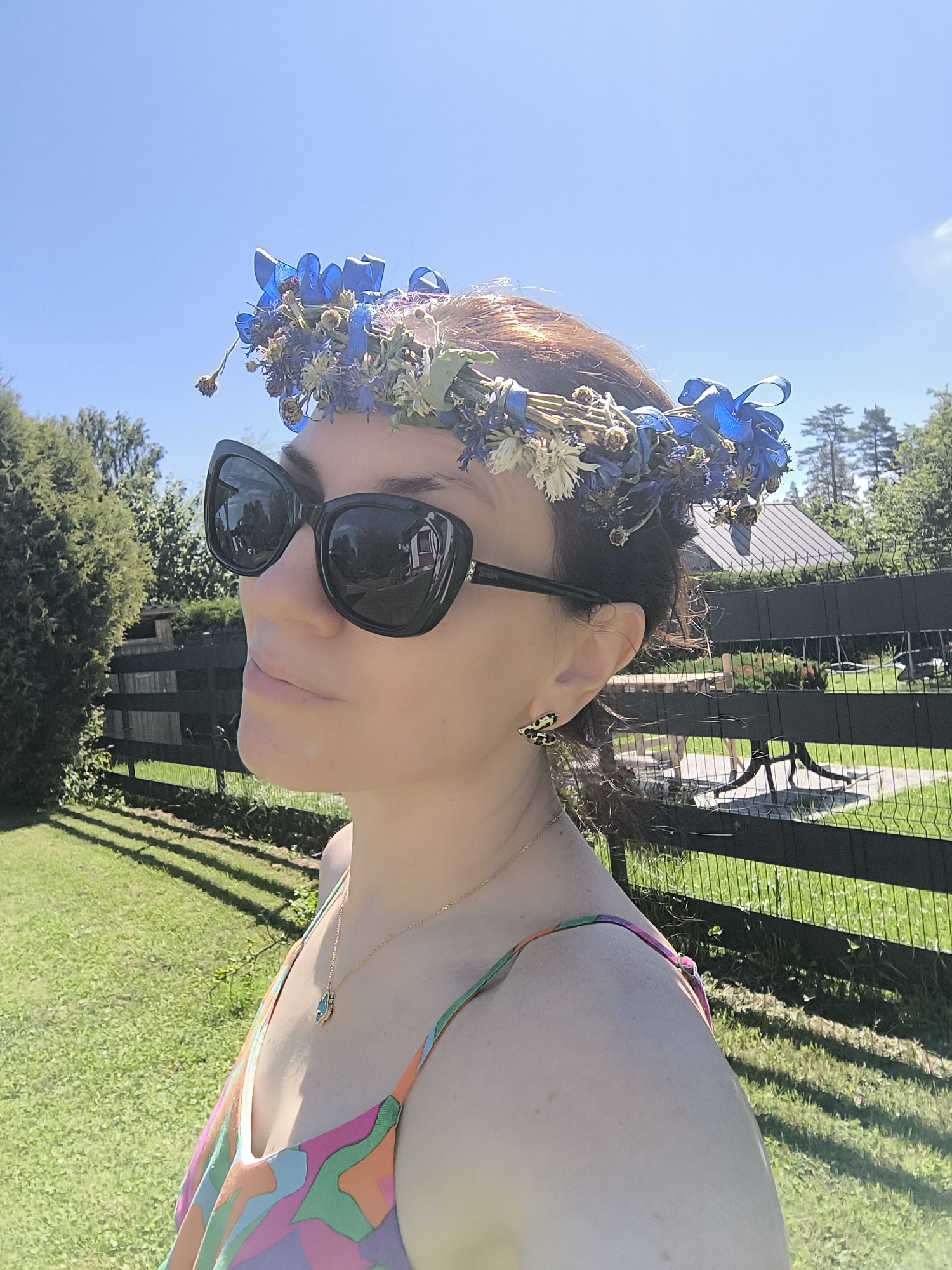 Outdoor meditation session with floral crown and fresh fruit, Latvia