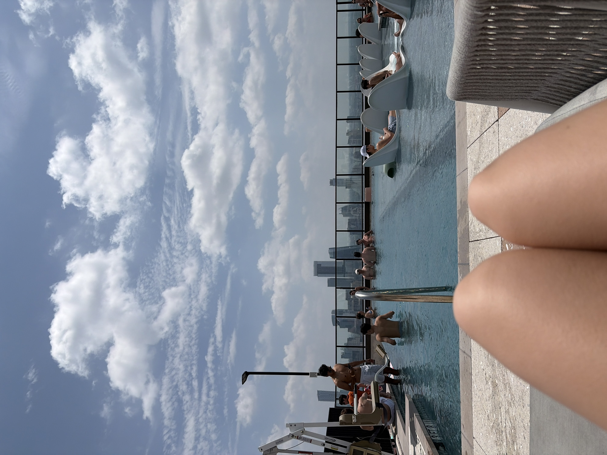 Rooftop pool scene captured in Austin on sunny day