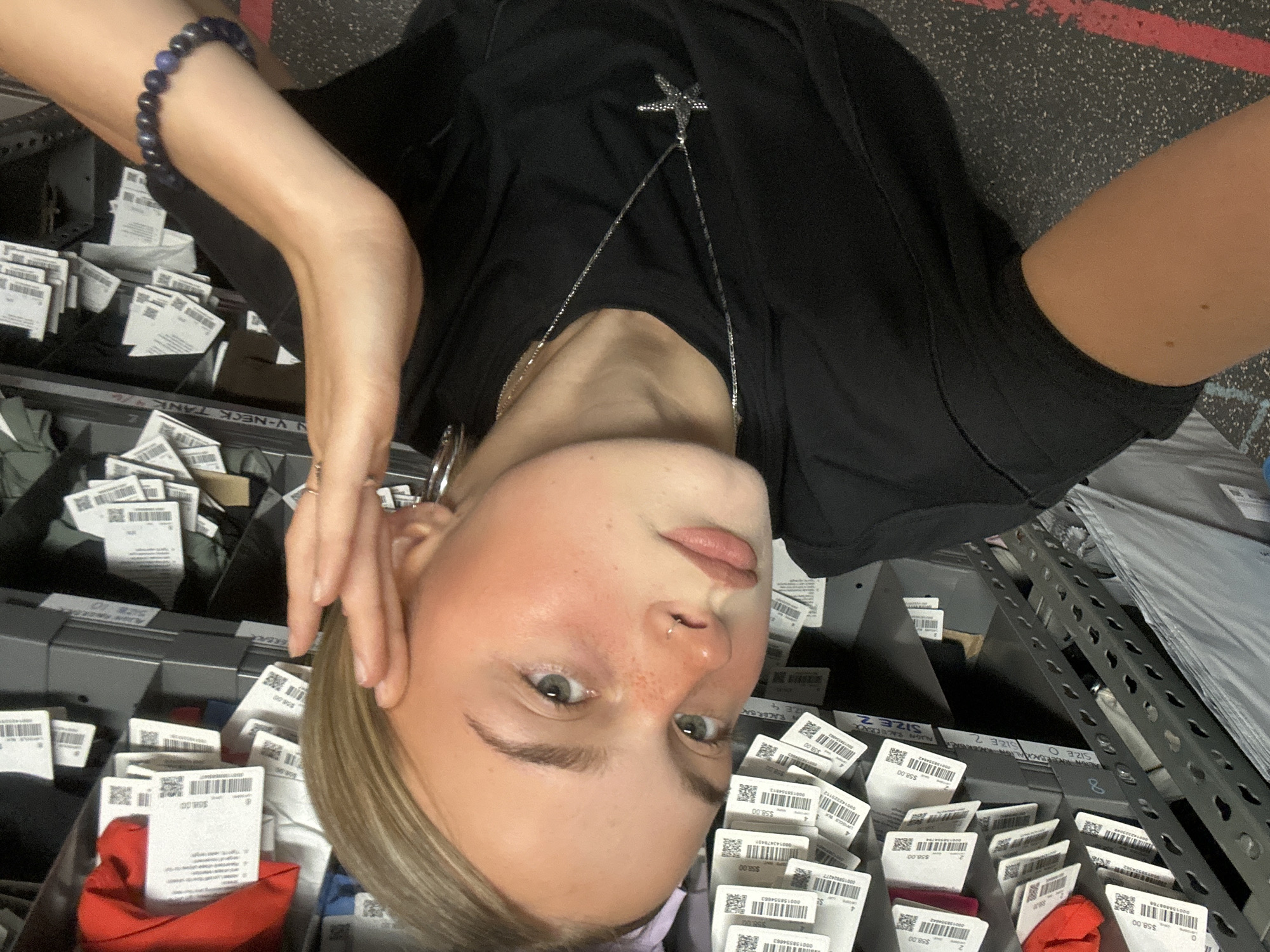 Employee photographed with RFID scanner in Whistler retail location