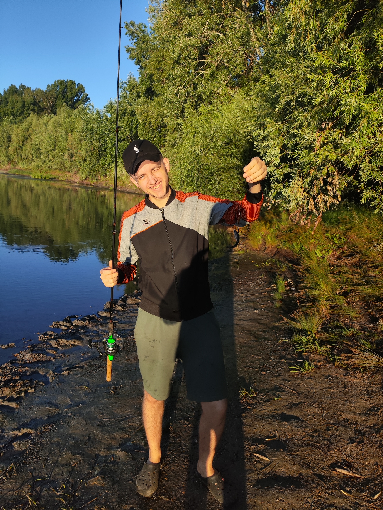 Fishing on a calm river outside Tiraspol, Moldova