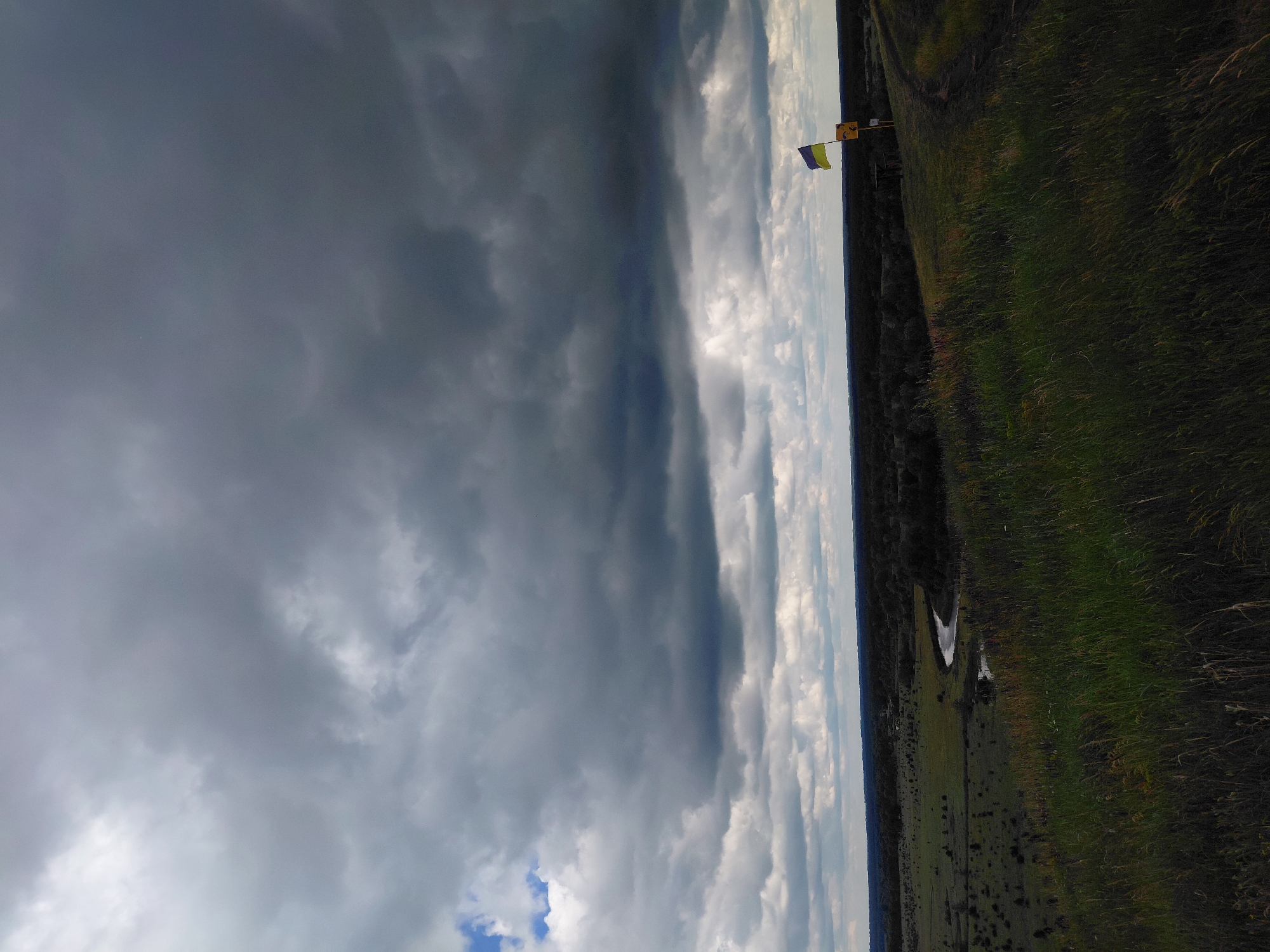 Storm clouds gather over Ukrainian countryside near Ustyvytsia