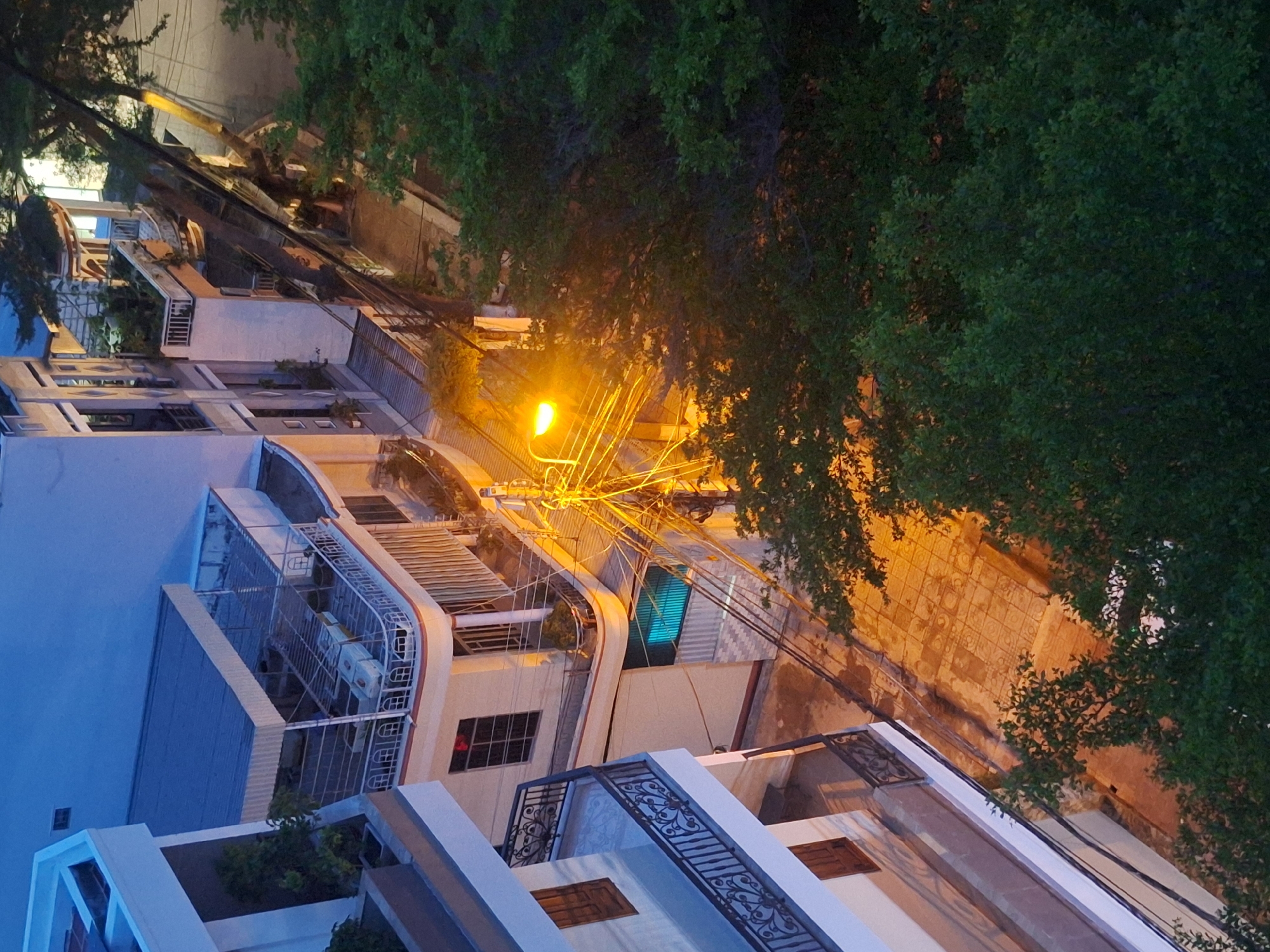 Nha Trang skyline at dusk, rooftops to coastline