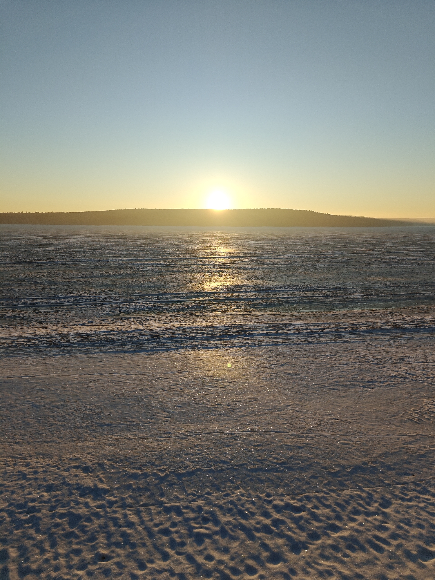 Early morning winter walk documented along Kama River in Chaikovsky
