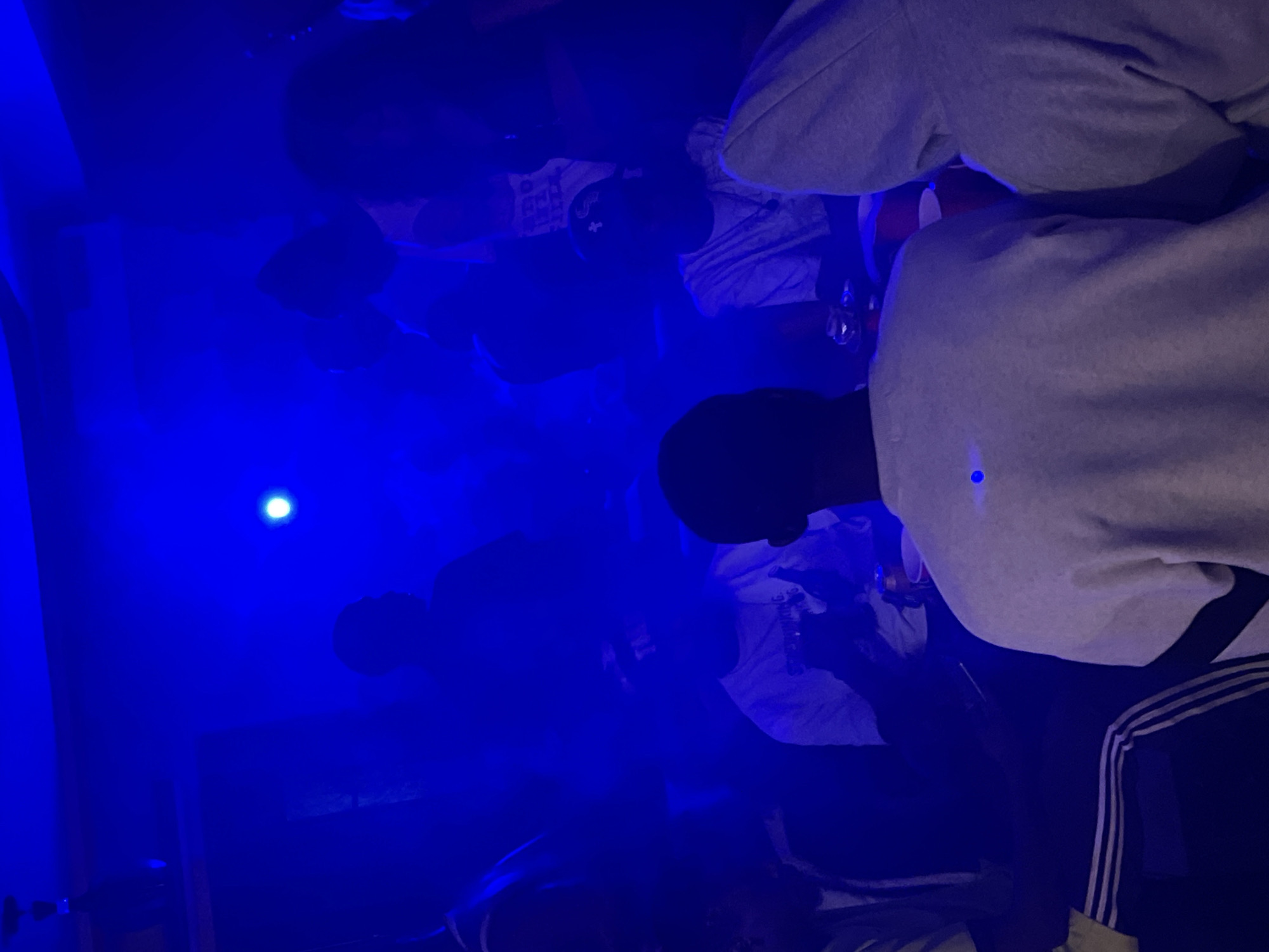 Night out at a blue-lit club in Durumi, Nigeria