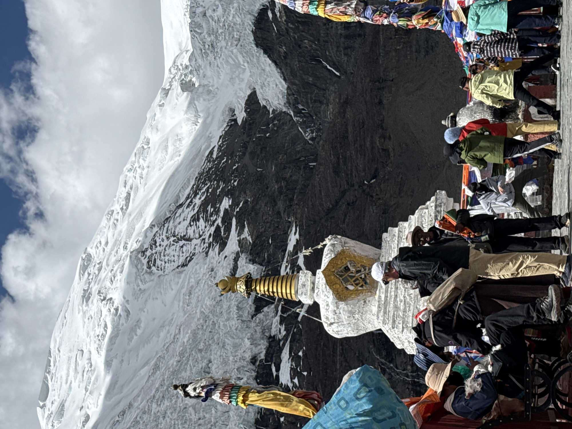 Buddhist stupa observed amid snowy mountains in Gyantse County