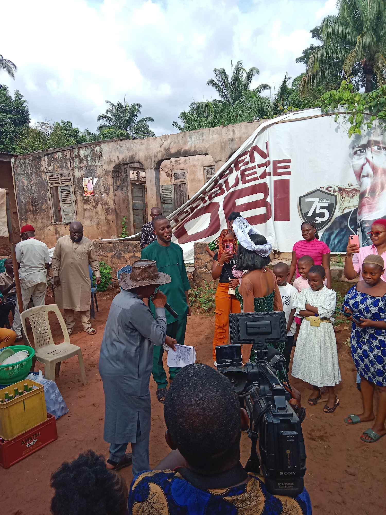 Community gathering features speakers, traditional dress in Udi Nigeria