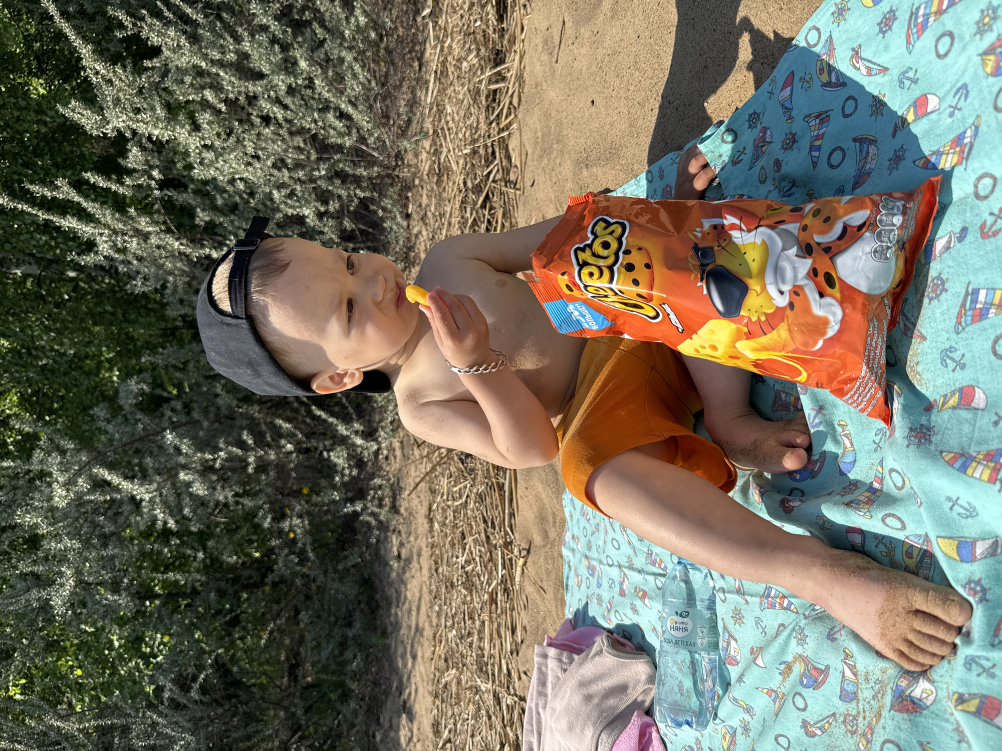 Mother and toddler enjoy beach day in Rusanovo, Russia