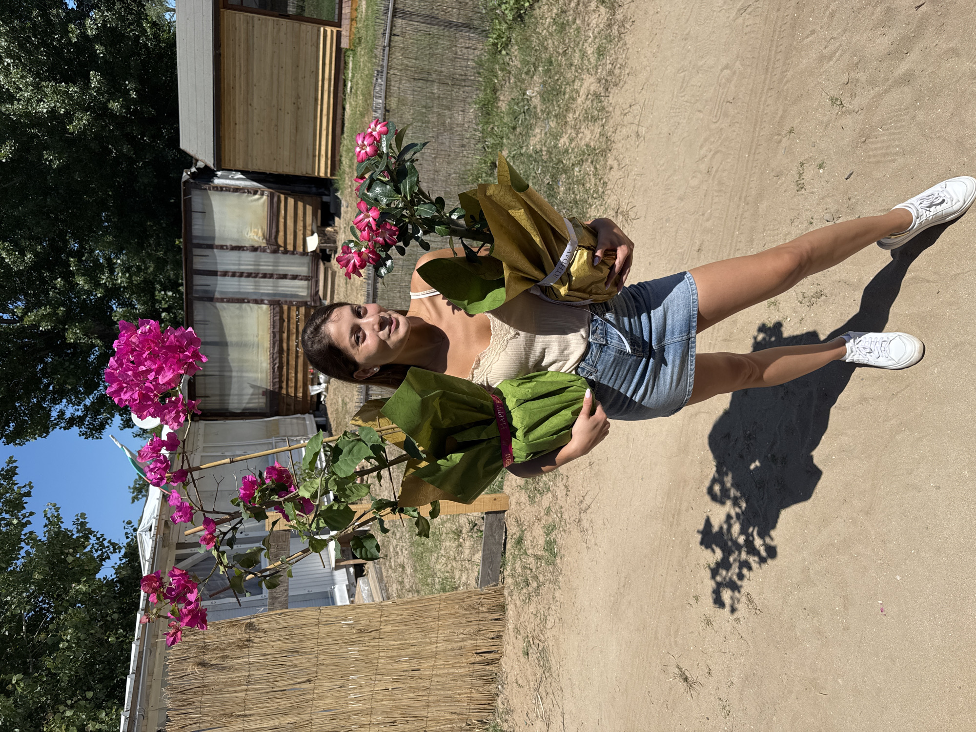 Woman with potted plants spotted in Sozopol, Bulgaria