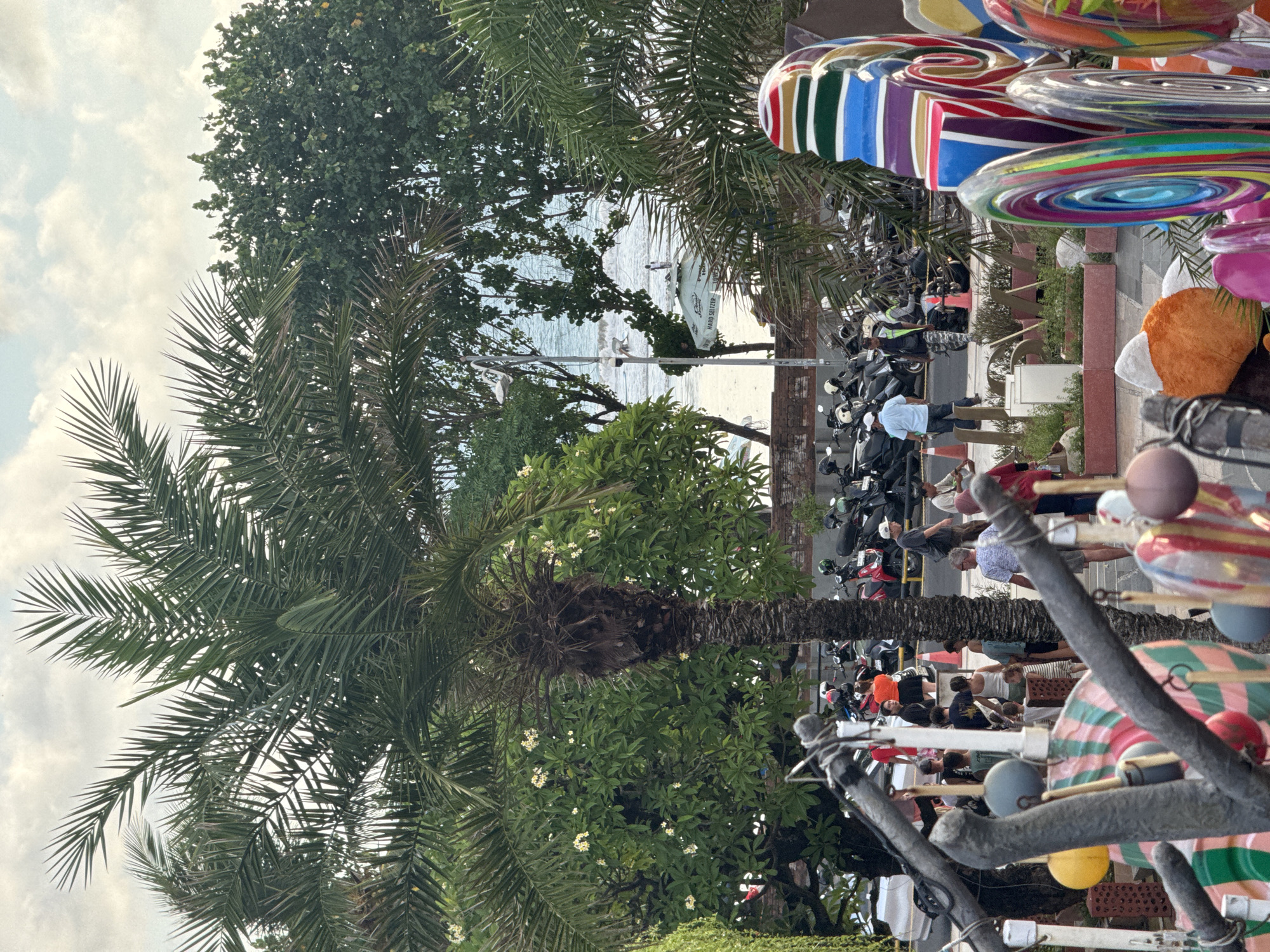 Tourist activities documented during Kuta Beach festival morning