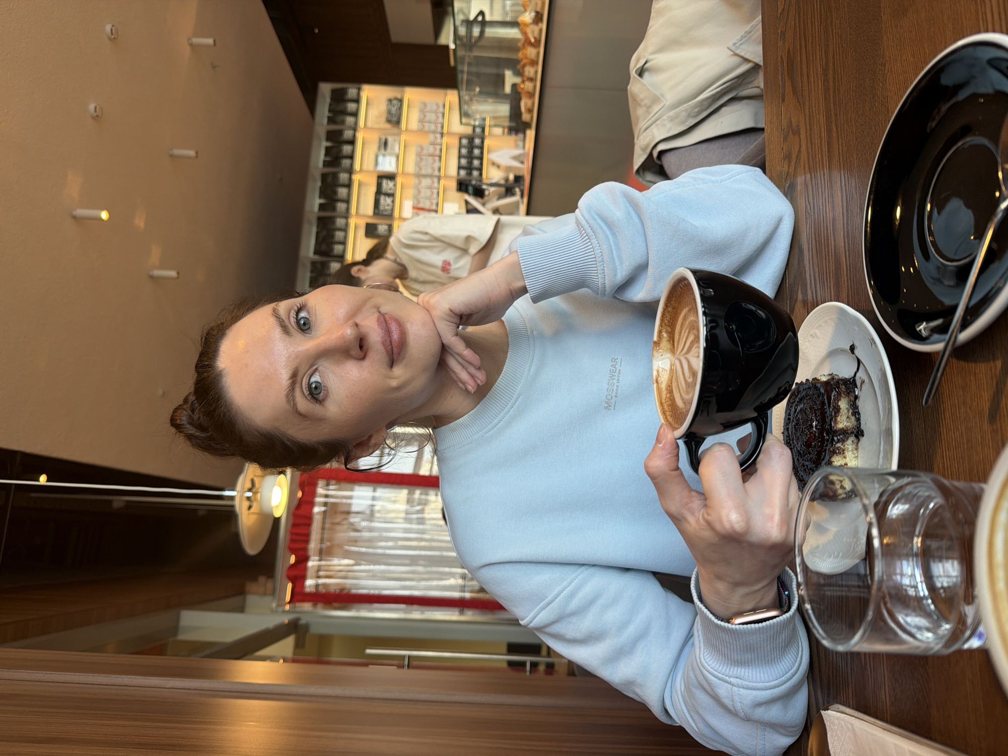 Women share coffee and conversation at Perm cafe