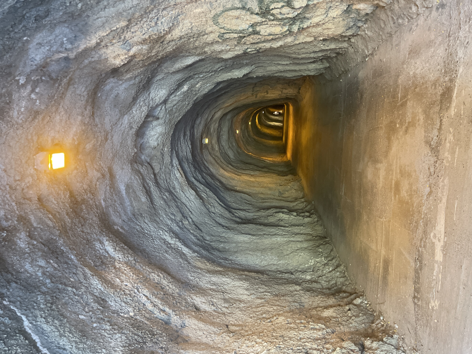 Illuminated tunnel with textured walls documented in Kamenovo, Montenegro