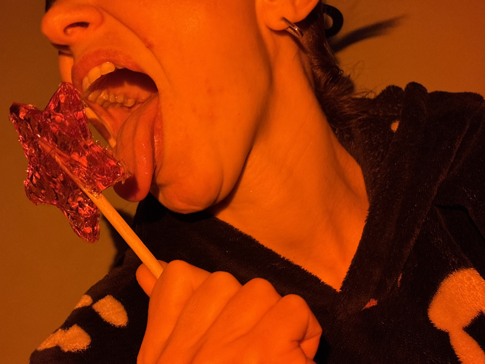 Woman photographed enjoying star-shaped lollipop in Russia
