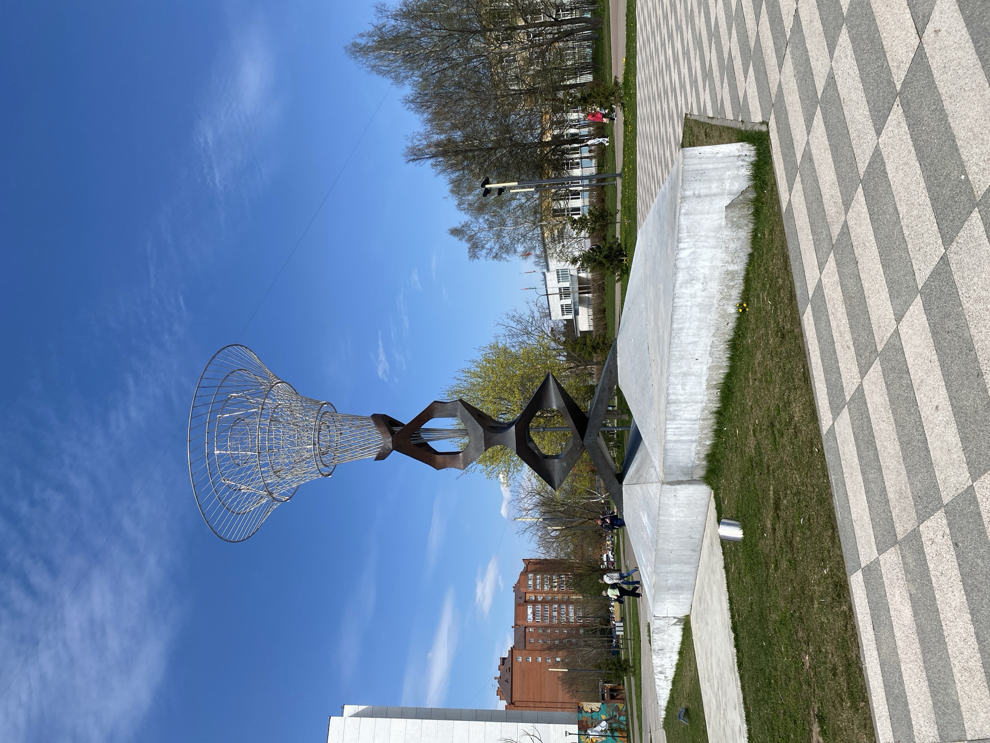 Modern wire mesh sculpture observed in public space