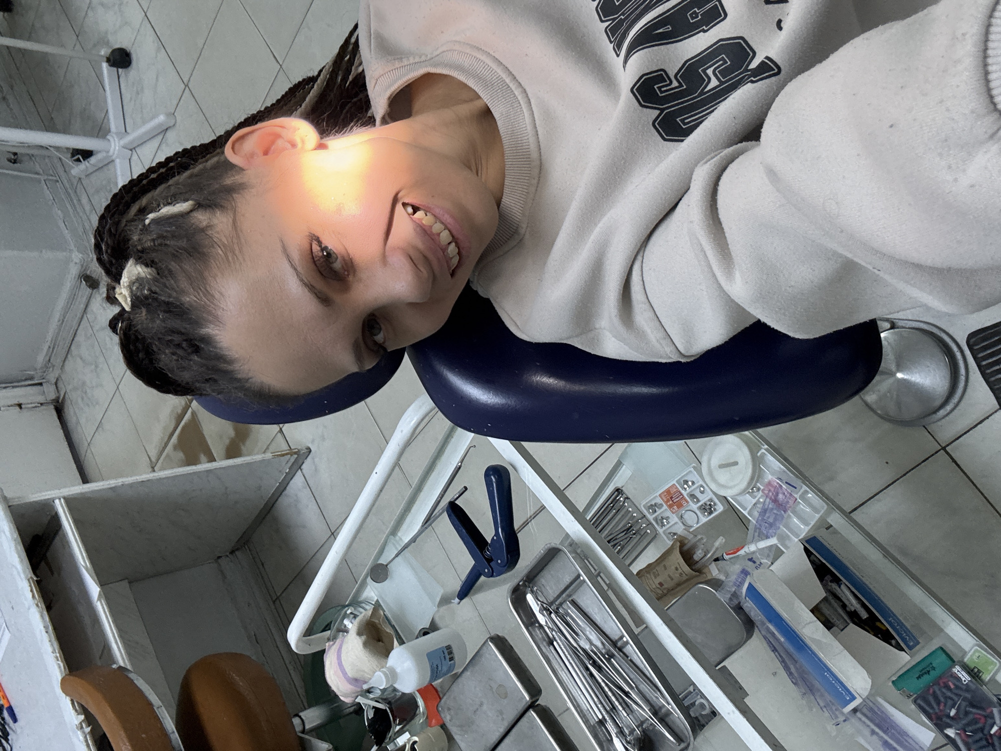 Woman receives dental treatment in Rusanovo clinic