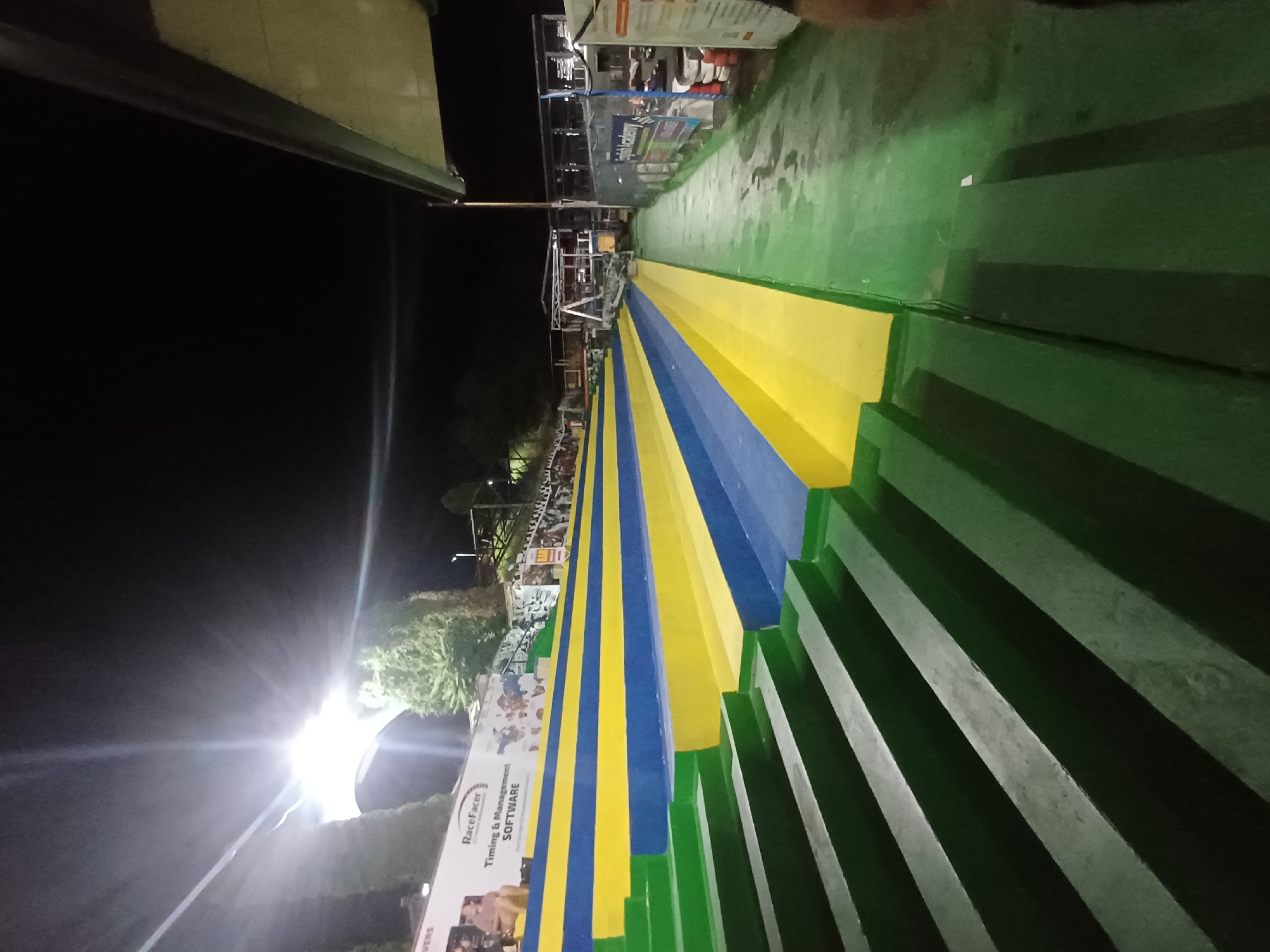 Colorful painted stadium steps glowing under floodlights in Varna
