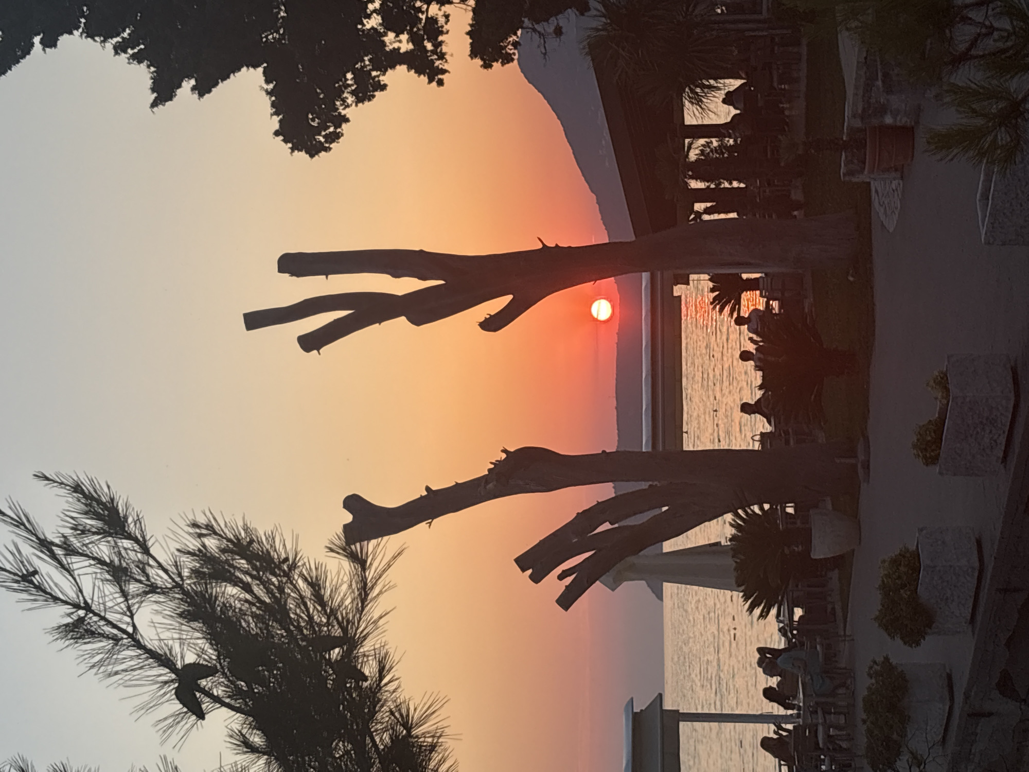 Sunset hour on the pebble beach in Bar, Montenegro