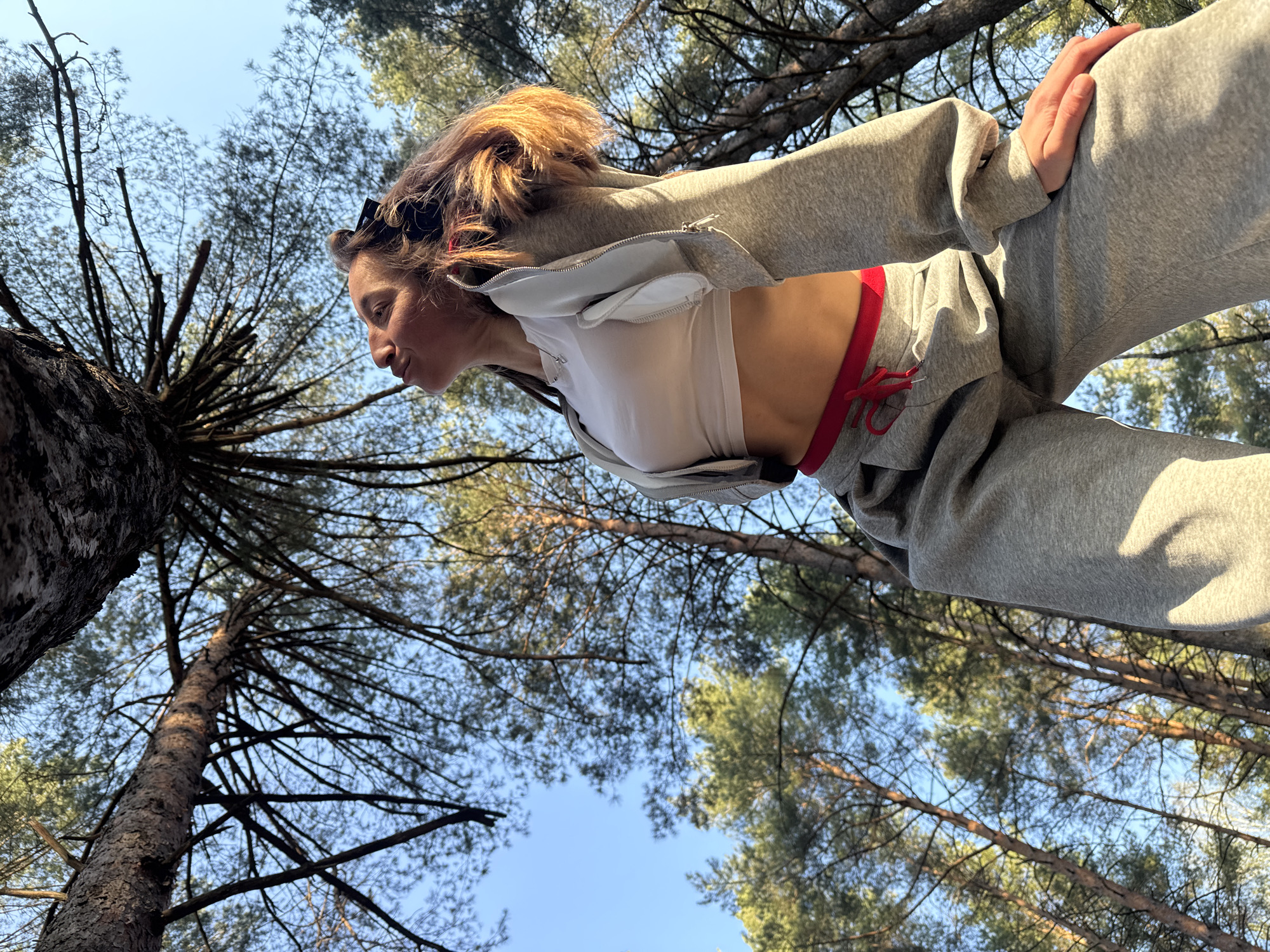 Woman photographed with dog in Russian forest near Прикамский