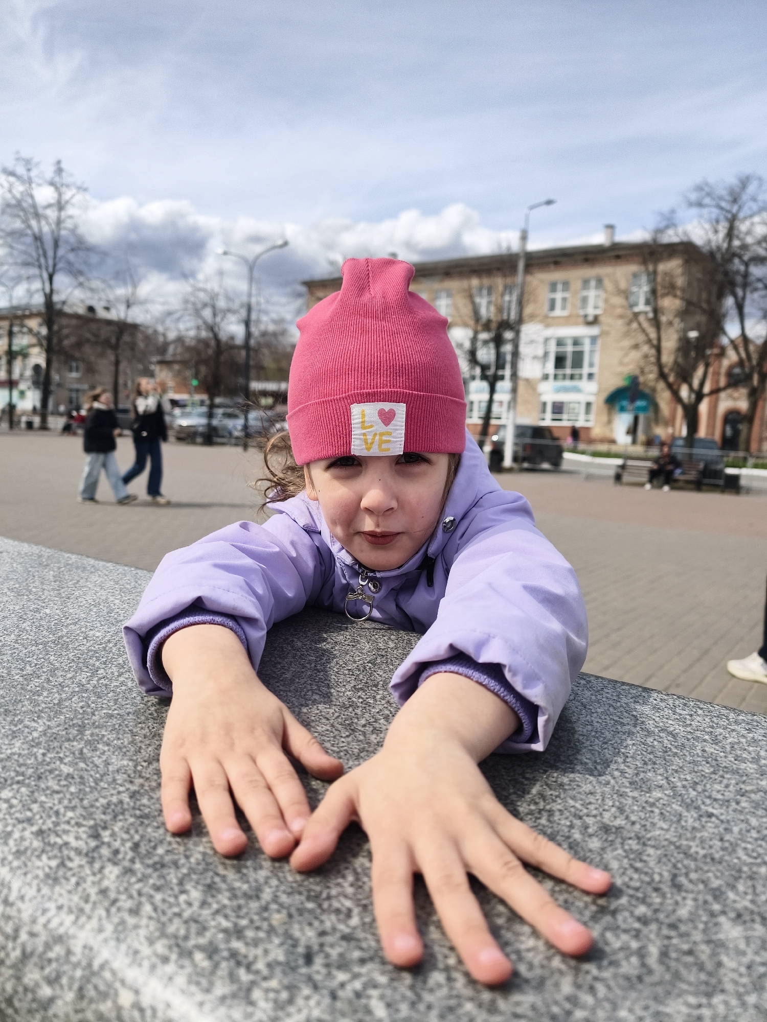 Girl explores Chaikovsky's public spaces during morning outing