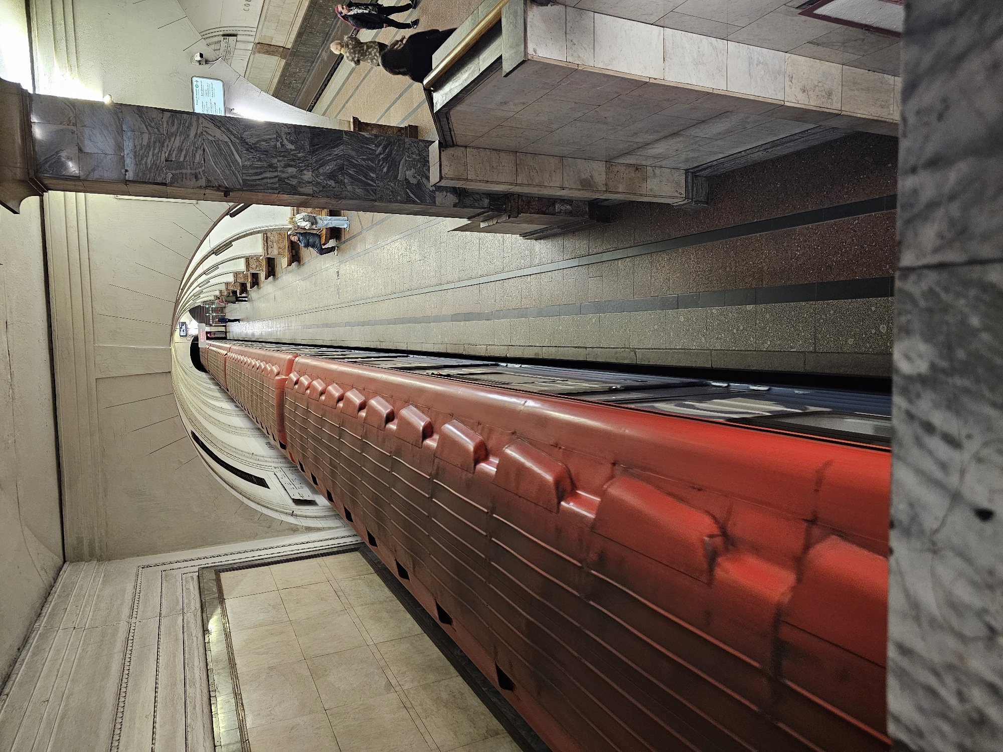 Red train spotted at marble Moscow Metro station