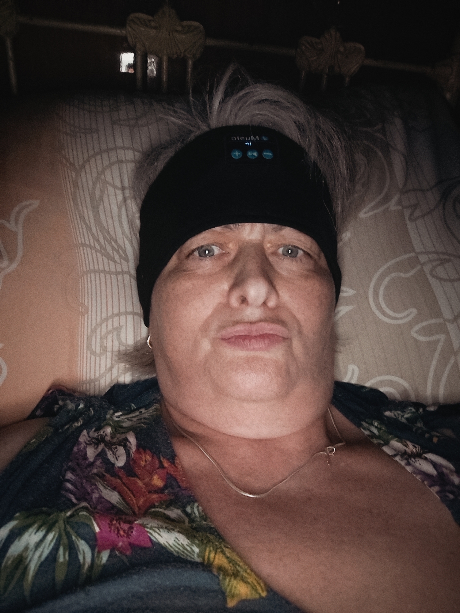 Woman documents evening moments in Krasnodar bedroom selfie session