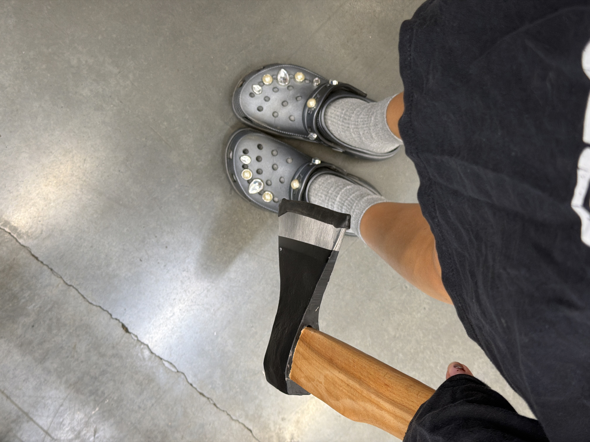 Blinged-out Crocs and a small axe, Ust-Ilimsk