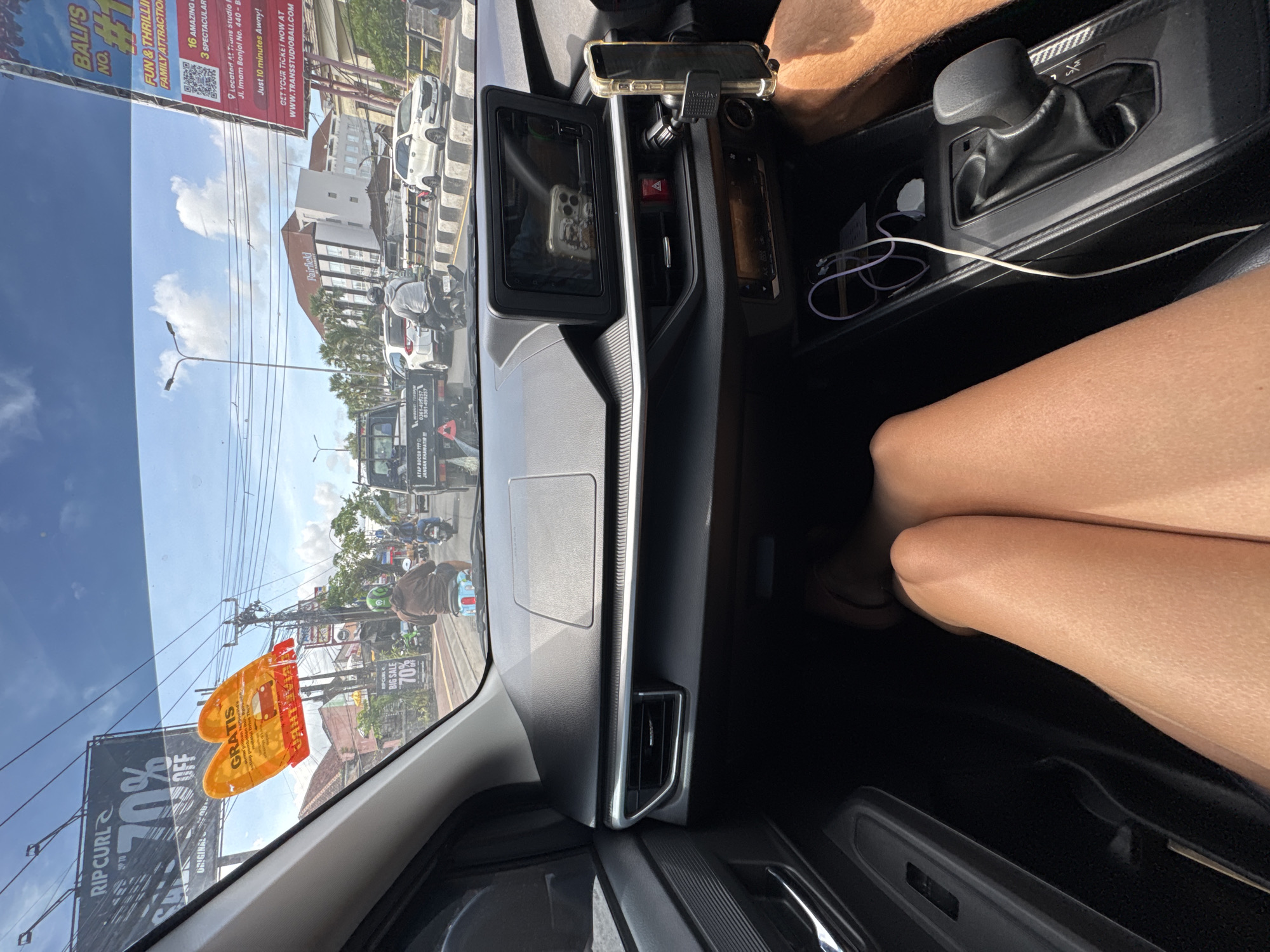 Vehicle interior view captured on Kuta street, Indonesia