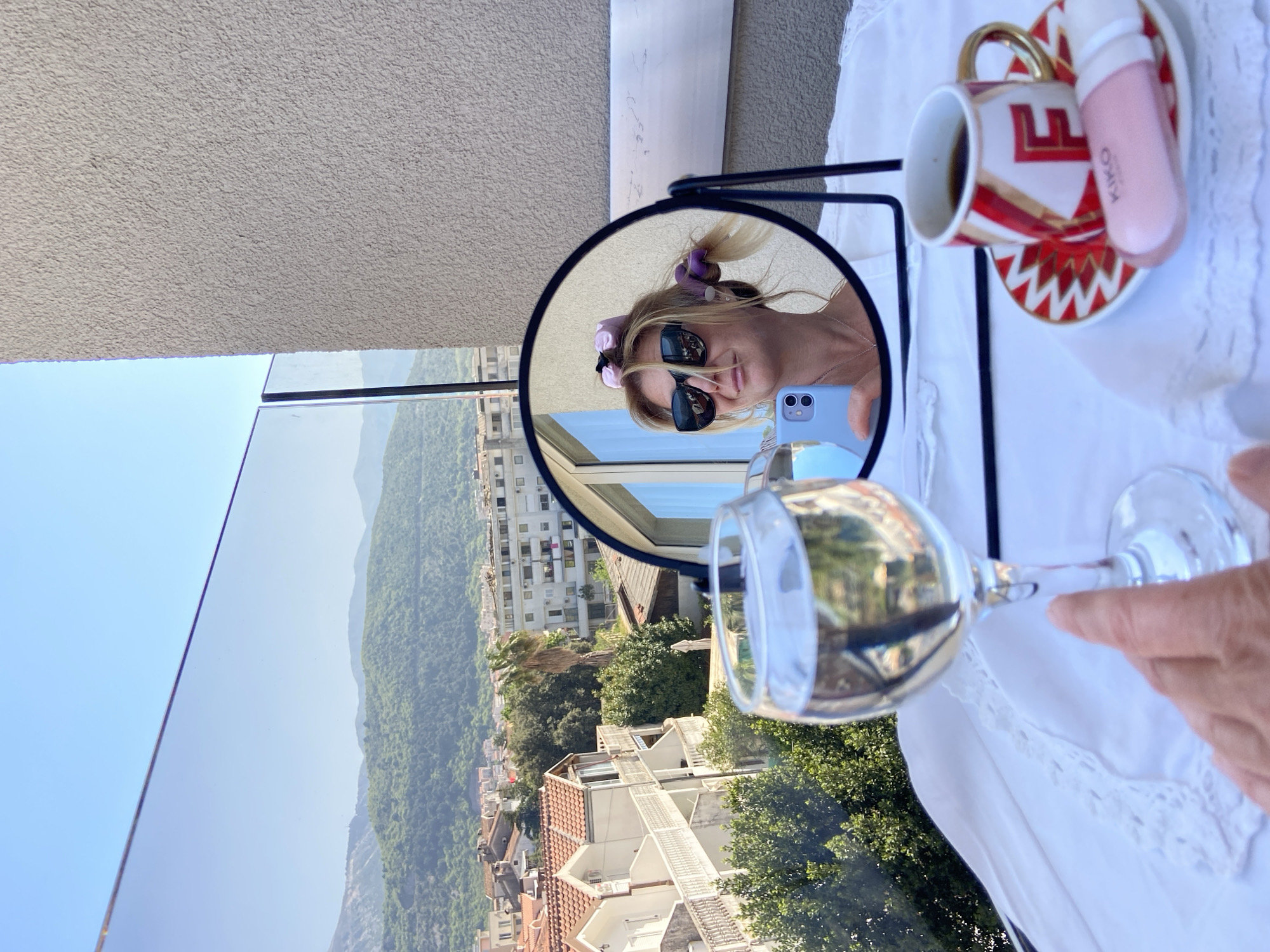 Morning balcony relaxation captured overlooking Budva, Montenegro