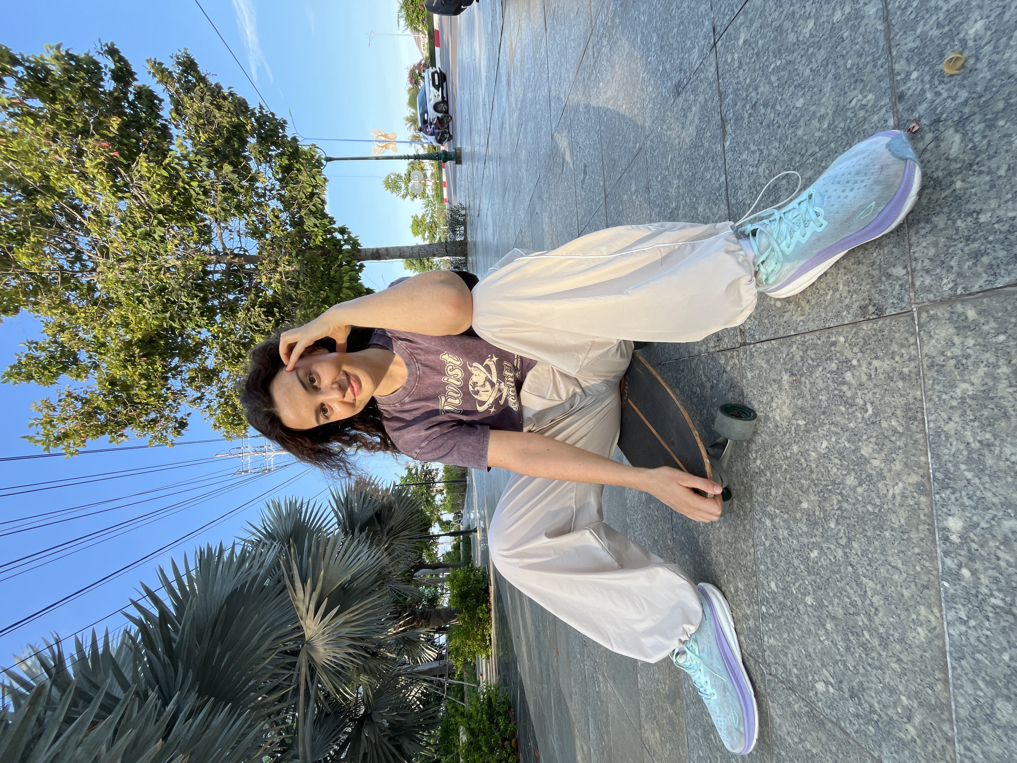 Skateboarding on a Phu Thuy Ward walkway, June 2026