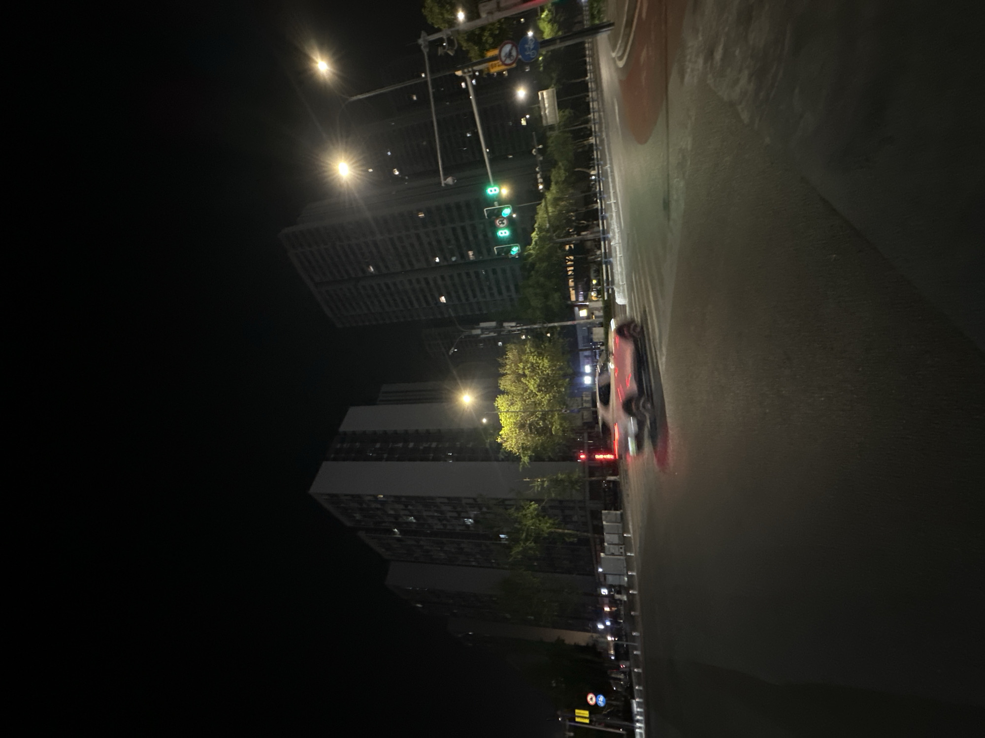 Nighttime street intersection documented in Chongqing High-tech Zone