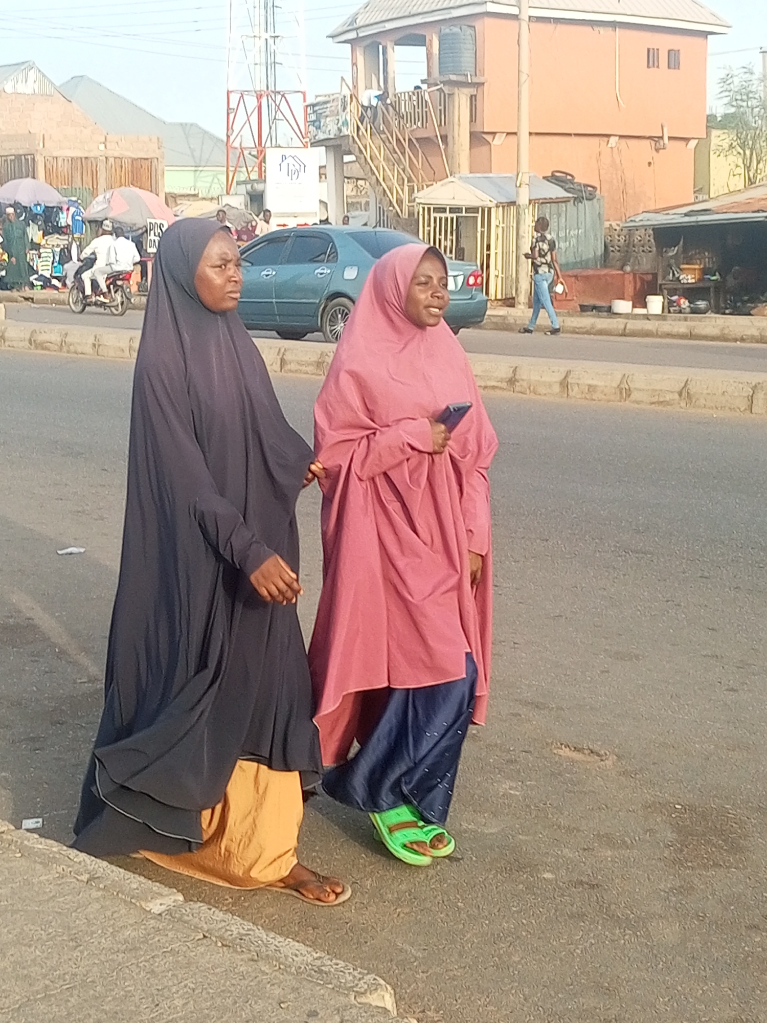 Daily street life documented across three Nigerian towns