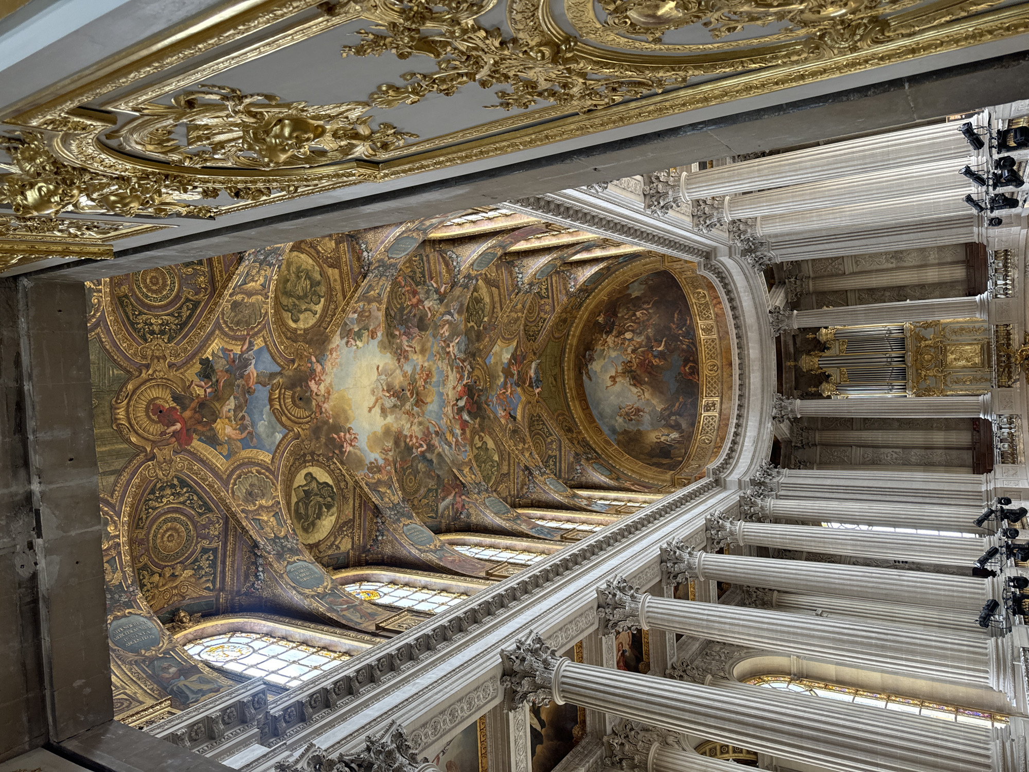 Versailles Palace interior with ornate ceiling documented by visitor