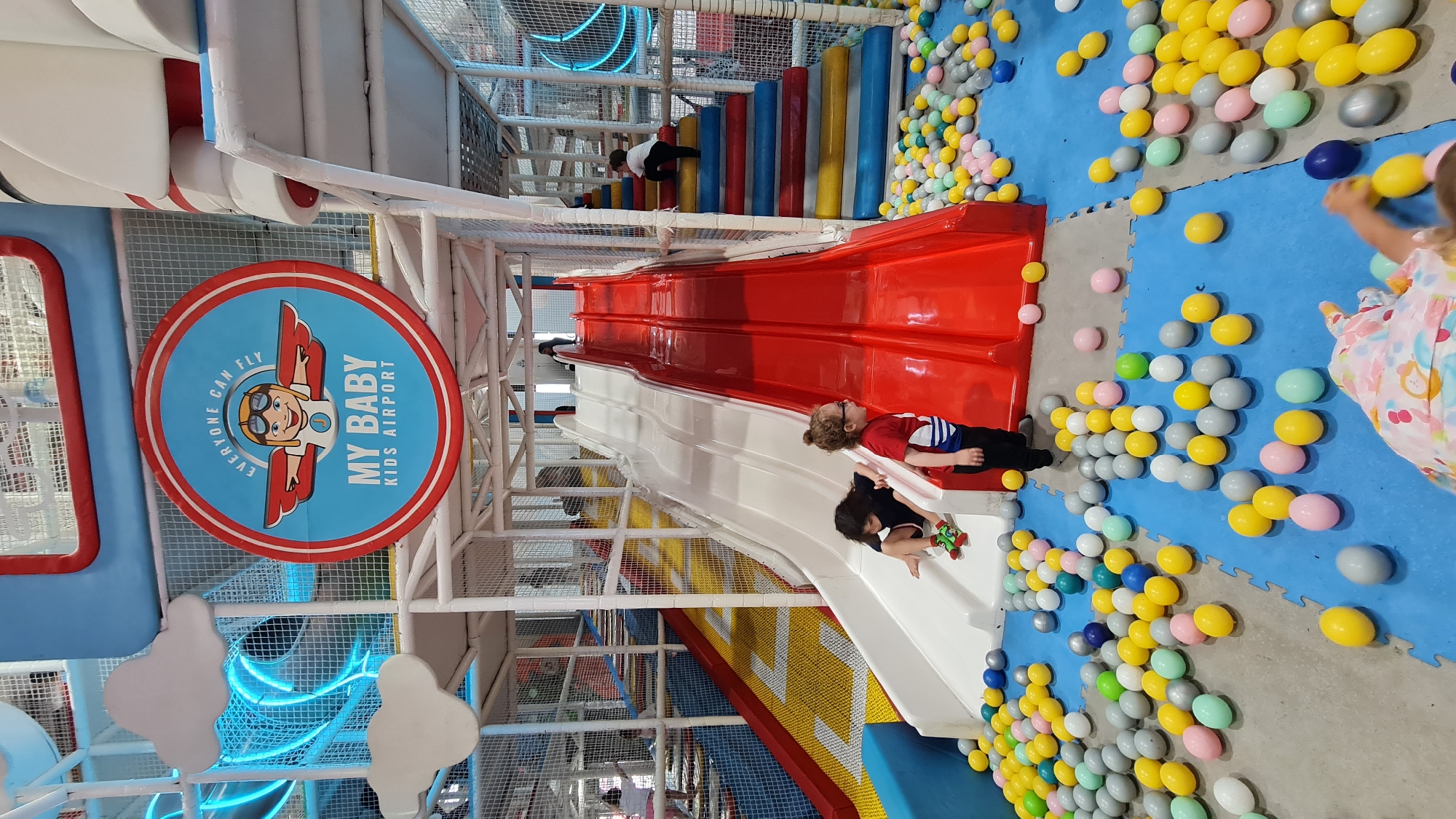 Children play at indoor playground in Al Jizah, Jordan