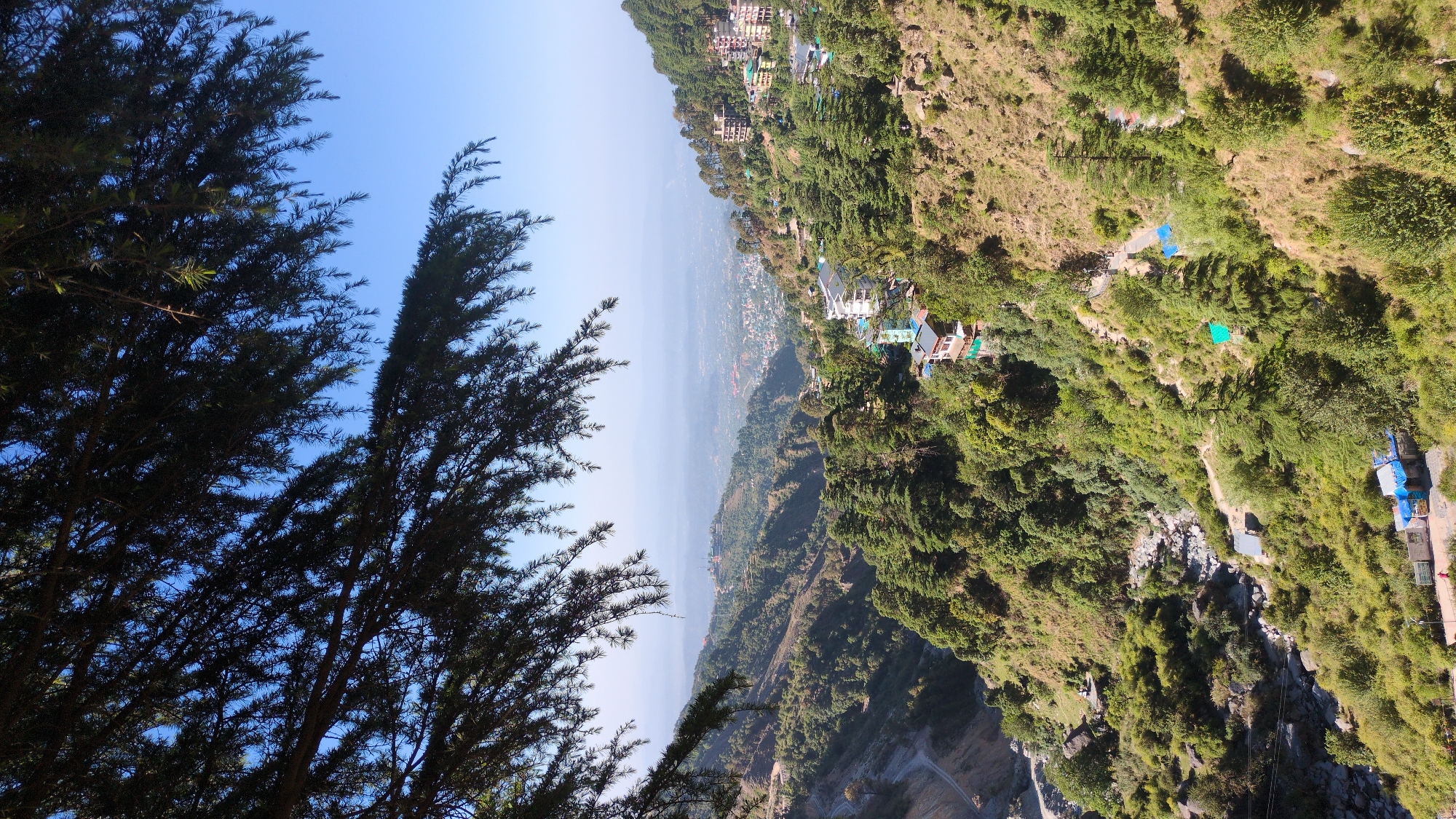 Hiker documents scenic mountain trail journey through Bhagsu, Haini India